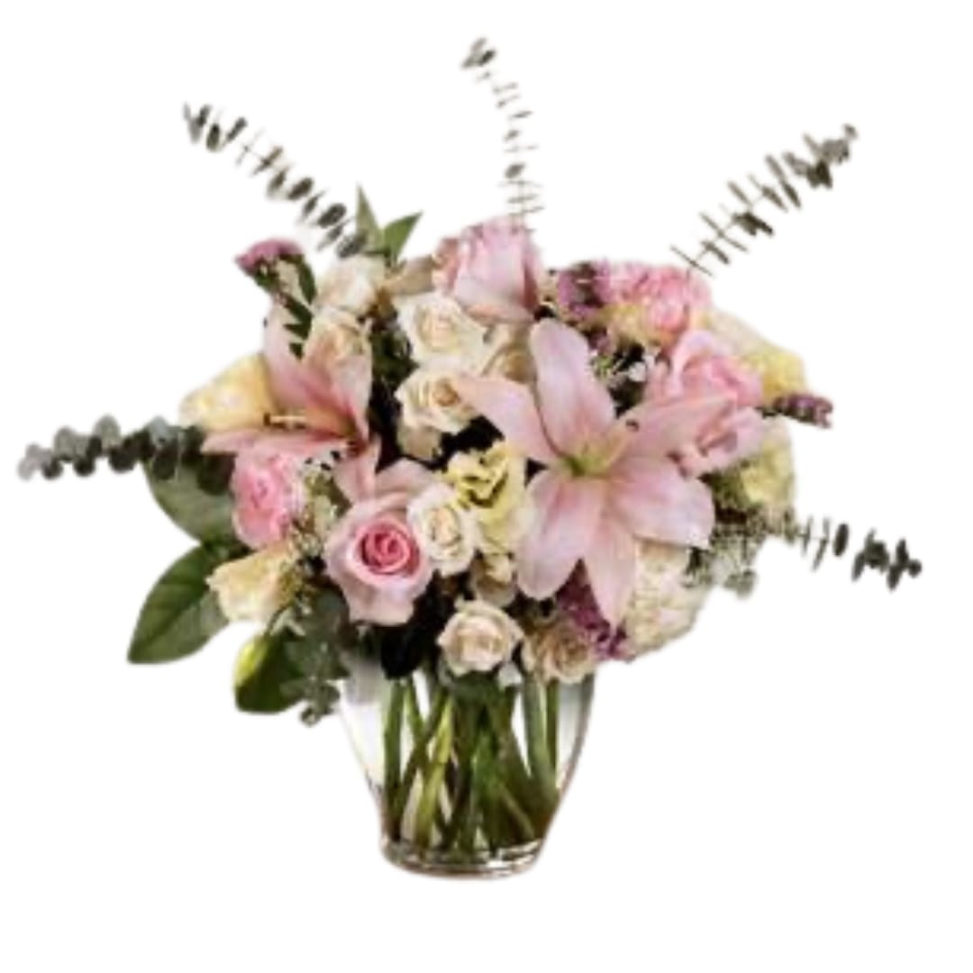 The FTD® Classic Beauty™ Bouquet - Soft, feminine, and blooming with a flowering finesse at every turn, this gorgeous fresh flower arrangement has a classic elegance to it that simply never goes out of style. Pink Asiatic Lilies serve as a focal point to this flower bouquet surrounded by cream double lisianthus, pink carnations, white spray roses, pink statice, and pink roses, lovingly accented with fronds of Queen Anne's Lace, stems of baby blue eucalyptus, and lush greens. Presented in a classic clear glass vase, this gorgeous gift of flowers is arranged just for you to create a treasured moment in honor of your recipient's birthday, an anniversary, or to celebrate the birth of a new baby girl. GOOD bouquet includes 12 stems. Approx. 16&quot;H x 18&quot;W. BETTER bouquet includes 14 stems. Approx. 17&quot;H x 19&quot;W. BEST bouquet includes 19 stems. Approx. 19&quot;H x 21&quot;W.