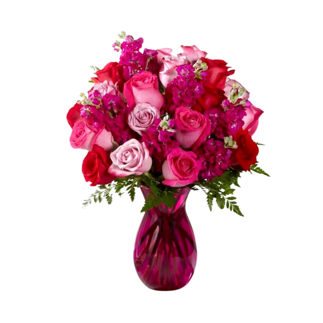 The FTD¨ Pure Romanceª Rose Bouquet - Exquisite - Utterly romantic and blossoming with your love through every blushing bloom, this gorgeous rose bouquet is out to convey your heart's every wish. Hot pink, red, and lavender roses mingle with fragrant fuchsia gilly flowers, beautifully accented with lush greens while seated in a vibrant pink glass vase. The perfect anniversary, &quot;I love you,&quot; or Valentine's Day gift! GOOD bouquet includes 9 stems. Approx. 14&quot;H x 11&quot;W. BETTER bouquet includes 12 stems. Approx. 15&quot;H x 11&quot;W. BEST bouquet includes 17 stems. Approx. 16&quot;H x 12&quot;W. EXQUISITE bouquet includes 24 stems. Approx. 17&quot;H x 14&quot;W. 