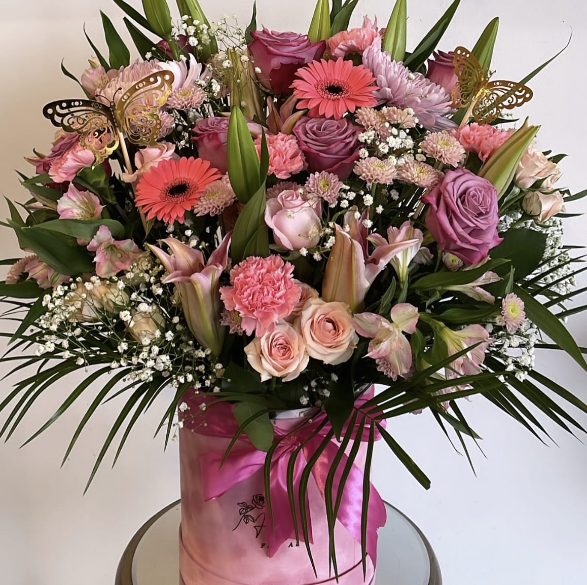 Pink for you Box -  Experience the exquisite beauty of delicate pink and white blossoms elegantly arranged in a luxurious pink suede box.