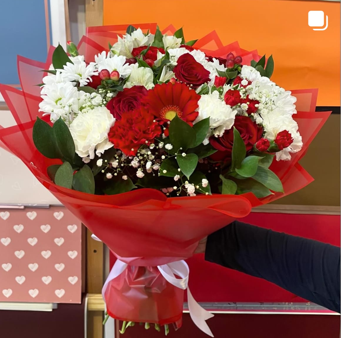 Deluxe Red and White Bouquet - Red and white mixed blooms in a hand bouquet