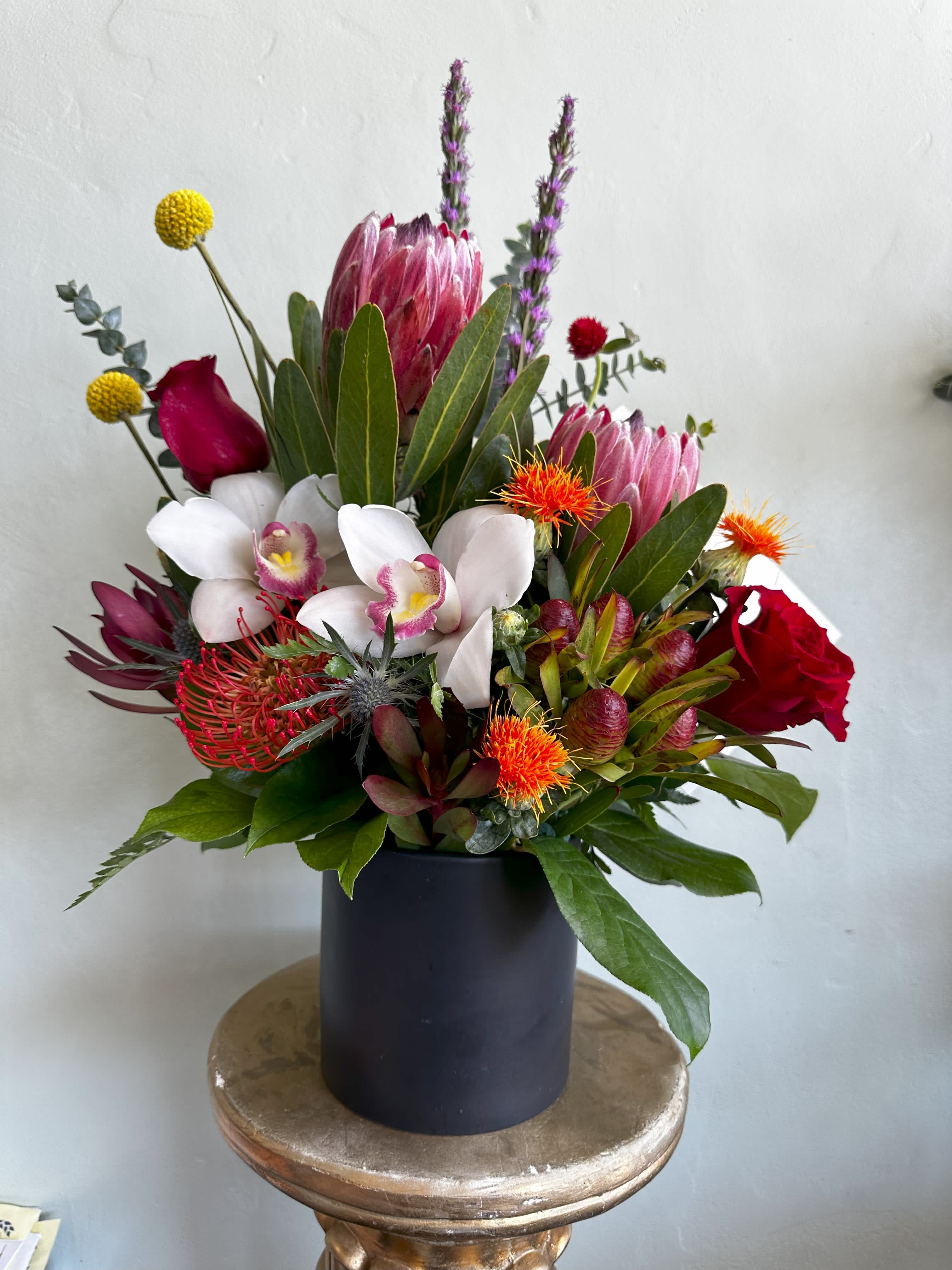 Billy Jean Billy Jean - A stunning tropical floral arrangement that transports you to the islands, where the gentle breeze caresses your skin.