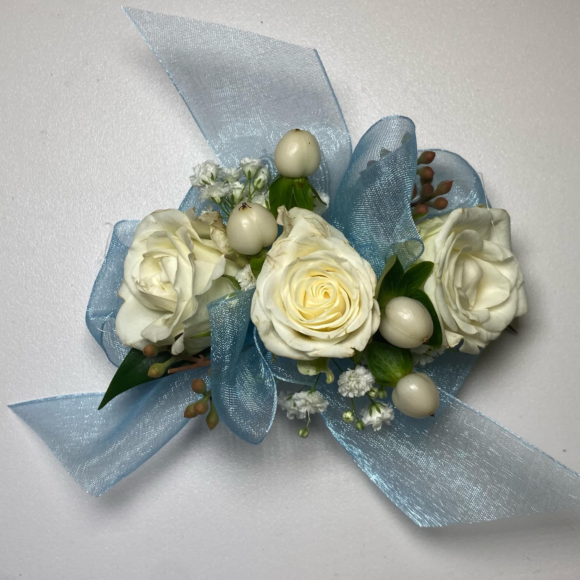 Baby Blue/ White Rose Wrist Corsage - Prom/ Wedding - This White Rose Corsage Includes an Adult Size Elastic Wristband, Baby Blue Chiffon Ribbon, White Spray Roses, Hypericum Berries, Gentle Greenery and Seeded Eucalyptus. Or as Similar as Possible.