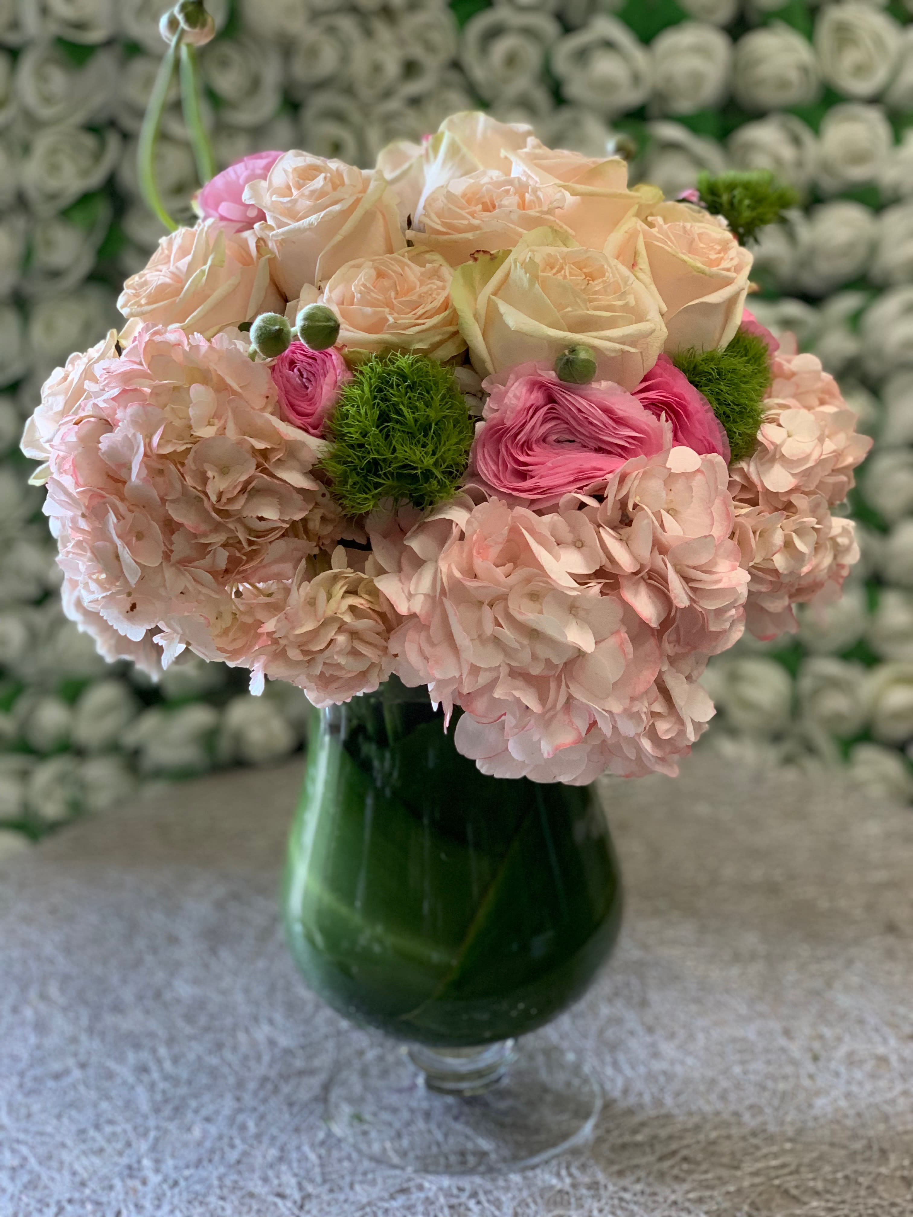 Blissful Blush Bouquet - Garden spirit roses, blush colors in a beautiful t-leaf covered vase.