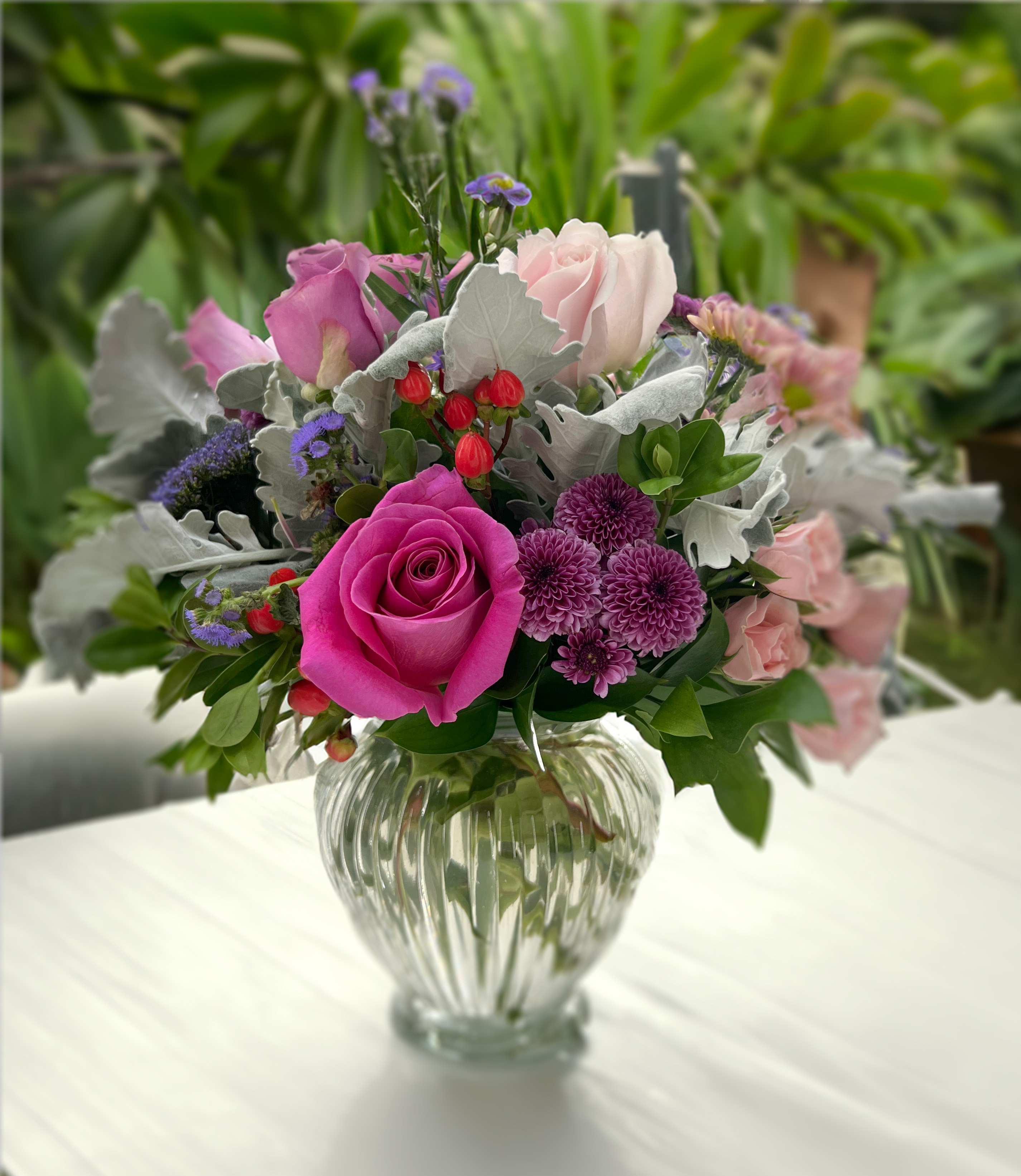 Low-Key Hues  - Soft colored mixed bouquet.