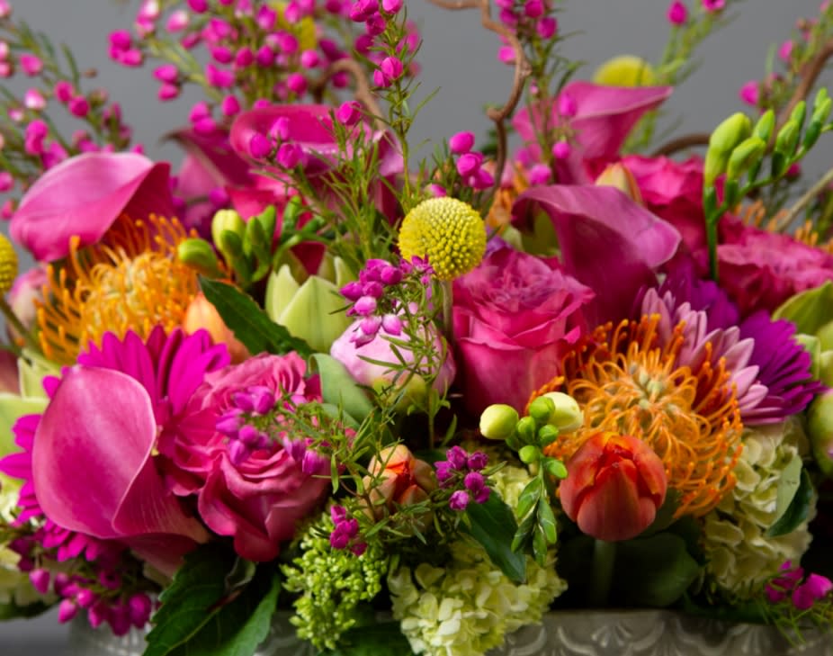Designer's Choice Colorful day Mother's Day - lush, colorful arrangement designed with a combination of premium flowers 