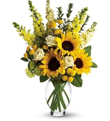 Here Comes the Sun Here Comes the Sun - Here comes the sun and it's all bright, especially when it comes to this gorgeous bouquet. Anyone who receives this golden arrangement will definitely feel its warmth. As if green roses next to yellow sunflowers and snapdragons weren't brilliant enough, we've added white stock, green button spray chrysanthemums, salal, myrtle and pittosporum to an exclusive Inspiration Vase. Item # T152-1A