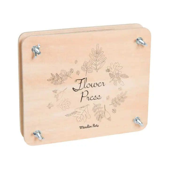 Flower Press Flower Press - This flower press is the perfect tool to dry the flowers and leaves that your little apprentice botanist has picked. This toy is made of wood and decorated with delicate vintage illustrations.