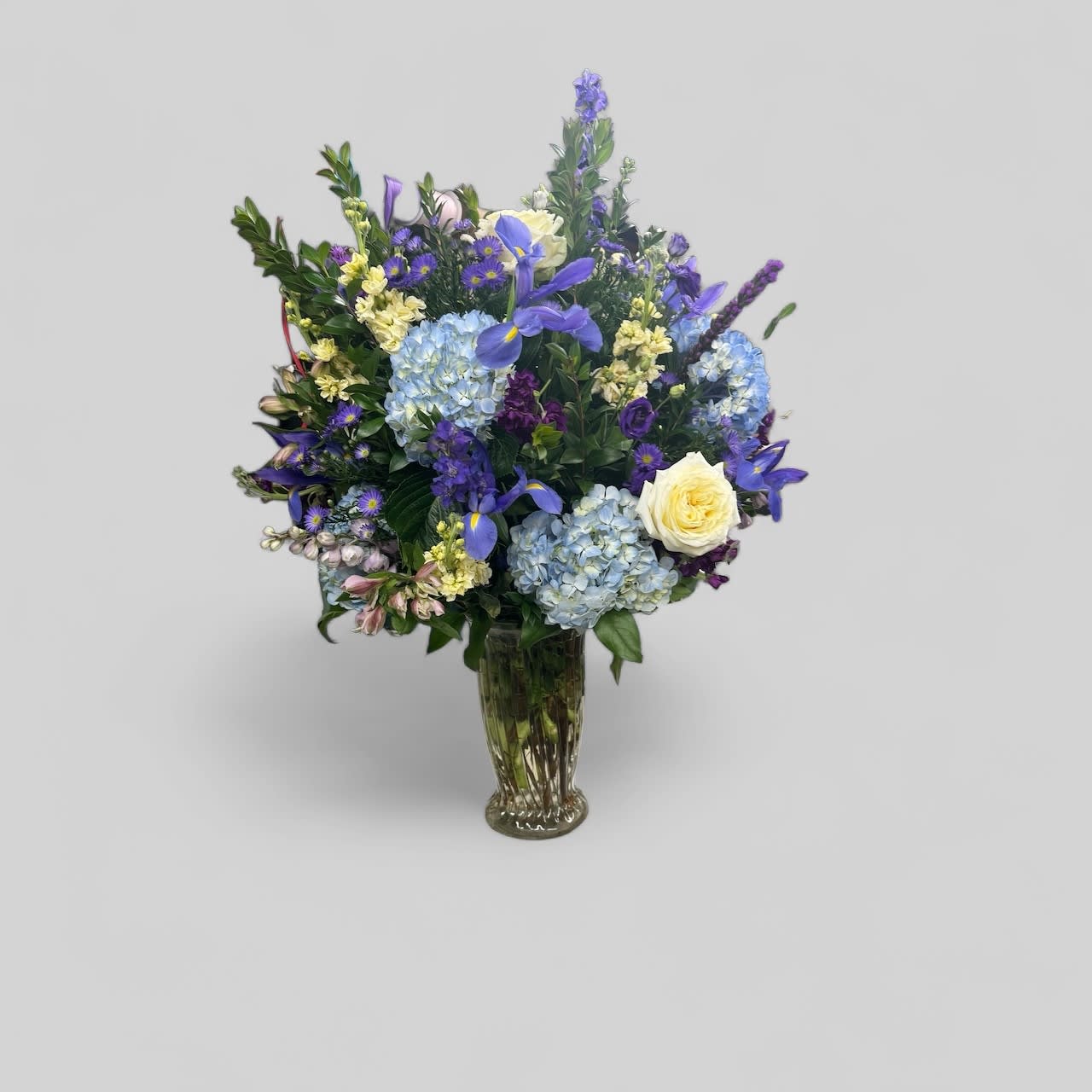 Spring Mix Funeral Vase Spring Mix Funeral Vase - Approx 24 Inches Tall. Available in assorted Color / Floral combinations. Call in Store to inquire.
