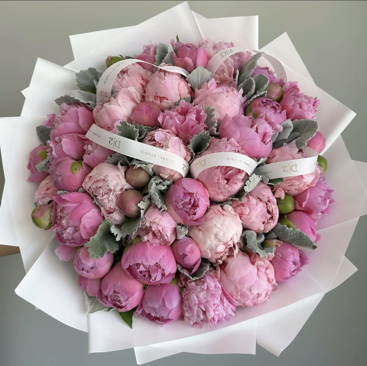 Timeless Elegance Timeless Elegance - Forever elegant bouquet featuring a collection of mono pink peonies.