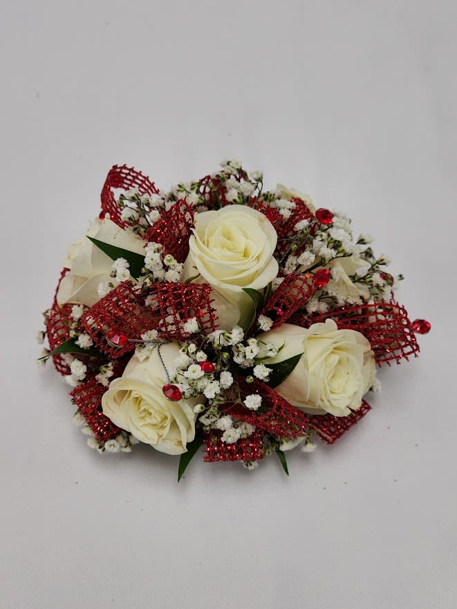 Scarlett Gems Wristlet Scarlett Gems Wristlet - Select this white spray roses wristlet corsage featuring white spray roses, babies breathe and bright red rhinestones with glittery red ribbon accents. This wristlet corsage will come on a simple silver elastic band. Exact flowers may vary.
