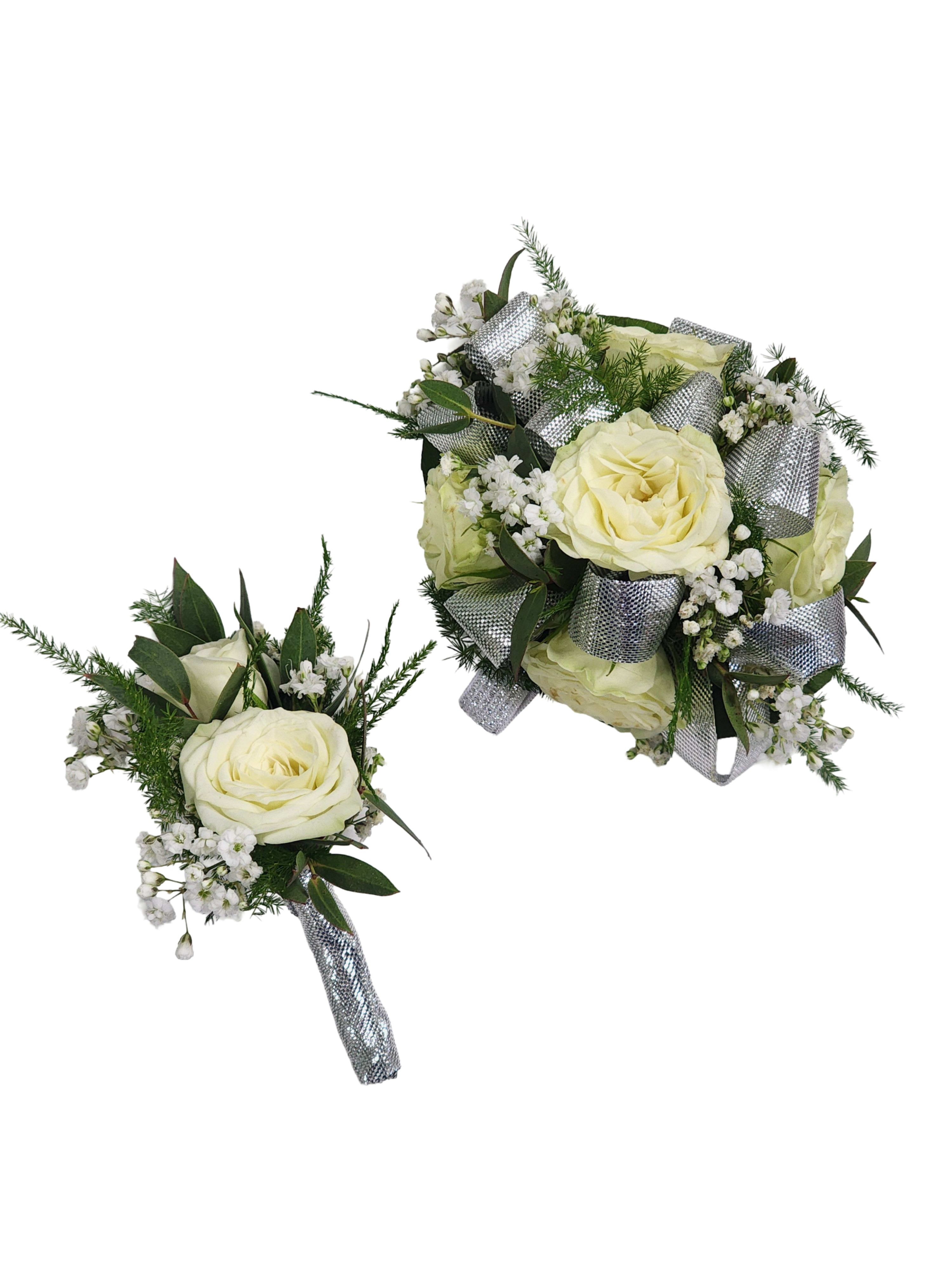 White Spray Rose Wristlet & Boutonniere Set White Spray Rose Wristlet & Boutonniere Set - Select this lovely and traditional set of a white spray rose wristlet corsage and boutonniere. Please place in special instructions time of pick up. Greenery may vary.