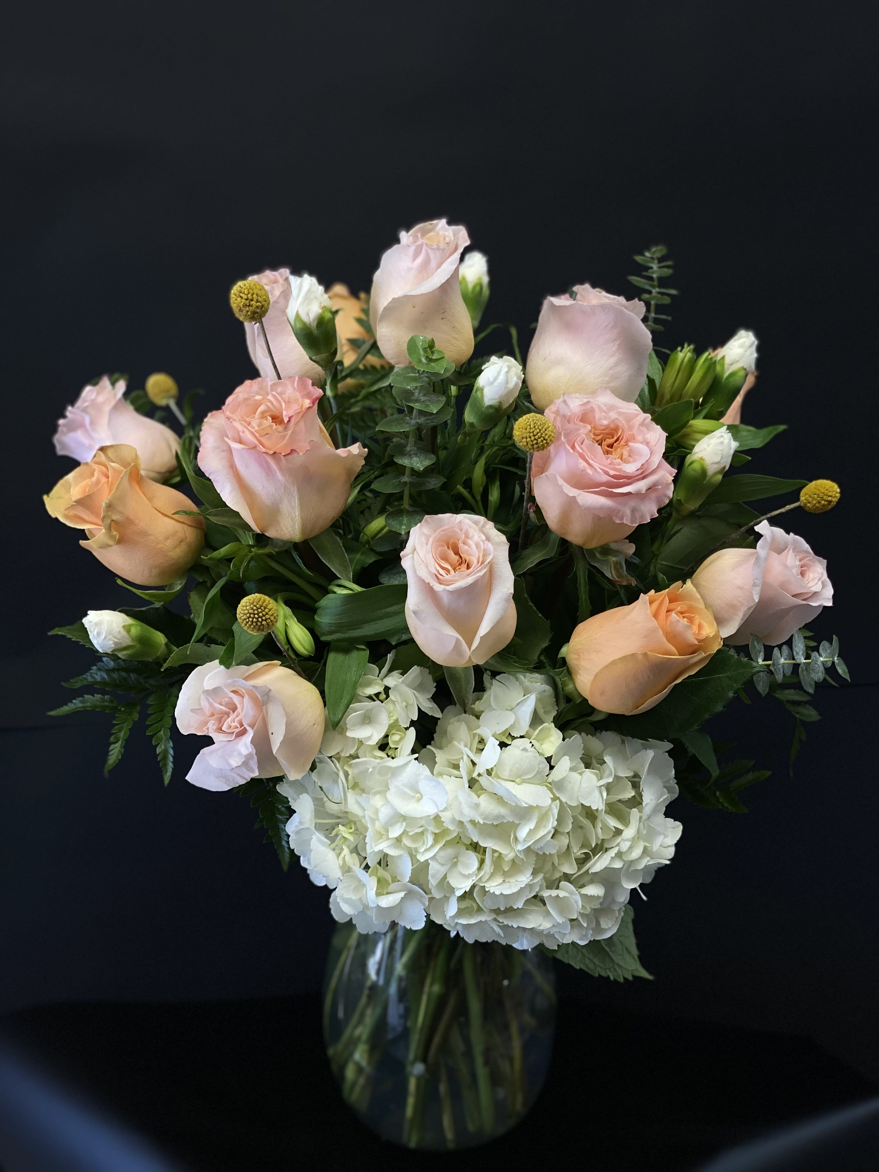 Gratitude  -  mix roses with alstroemeria, eucalyptus , hydrangea carnations , and billy balls  20h x 16w overall arrangement size 