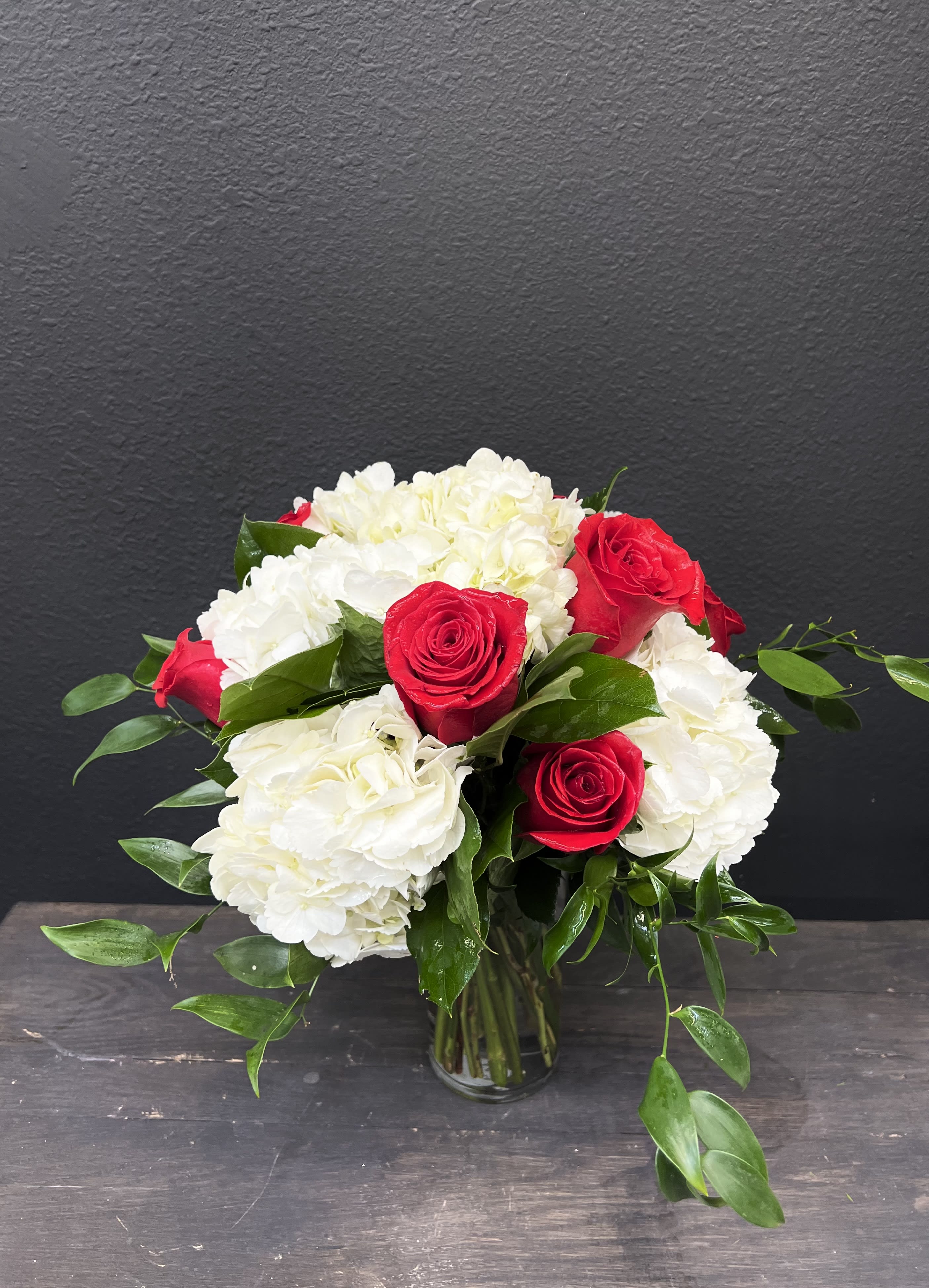 Lasting Love - Timeless and Classy! This European hand tied design could be carried down the isle!! White hydrangea and hot pink roses!! Doesn't get more timeless than this.