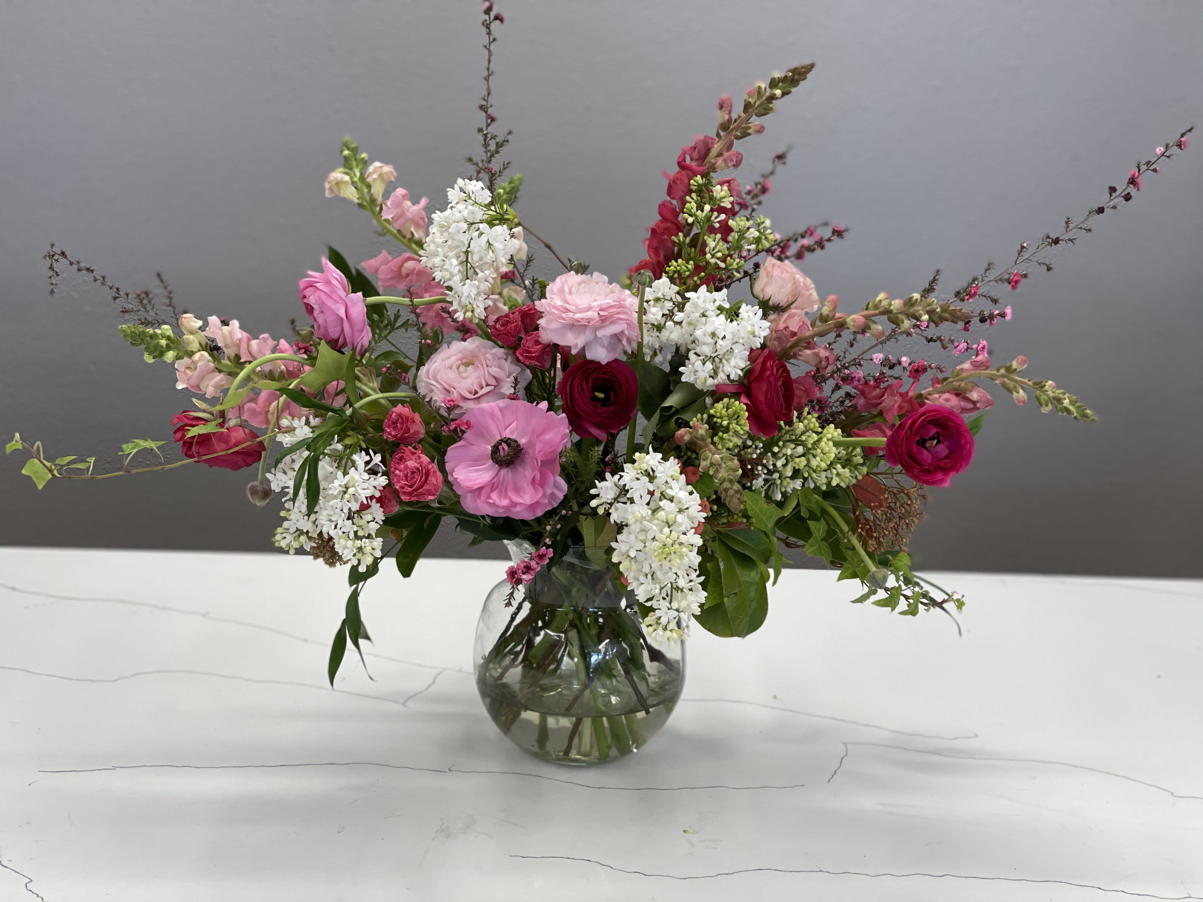 Bloomin' Love Bloomin' Love - This babe is straight out of the English Countryside with colors that'll make lovers' hearts pitter patter. Whimsy and romance's meet cute will bring stars to your lover's eyes.