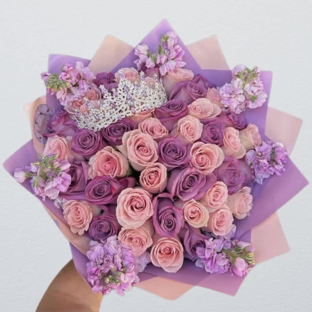 My Princess Bouquet - Beautiful Ecuadorian Lavender and Pink Roses With Stock flowers, topped With A Crown, Hand Tied Bouquet Wrapped Elegantly With Paper And Satin Ribbon. (Vase Not Included)  Choice Of 3 Sizes: 24 Rose Standard 36 Rose Deluxe 50 Rose Premium (As Shown)  