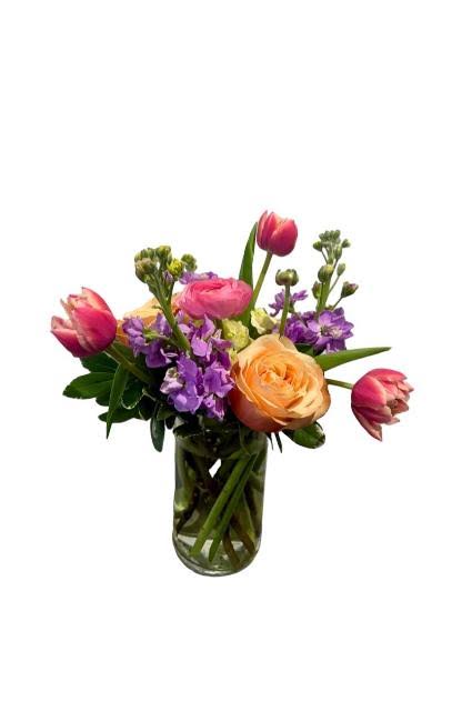 The Isla - Perfect for those craving that springtime feeling. This petite arrangement is great for any occasion and is sure to make anyone's day a little brighter.    *Standard arrangement pictured in 6x4&quot; glass cylinder.
