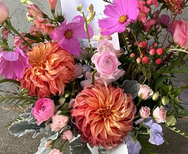Bold Luxe Bouquet Bold Luxe Bouquet - The "Bold Luxe Bouquet" has hot pink and coral as its primary colors. *Pictures are a representation of color pallets. The flowers in the photo may change based on availability.