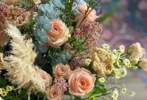 Pastel Grand Bouquets Pastel Grand Bouquets - The "Pastel Grand Bouquets" are full of peach and baby yellow accents. *Pictures are a representation of color pallets. The flowers in the photo may change based on availability.