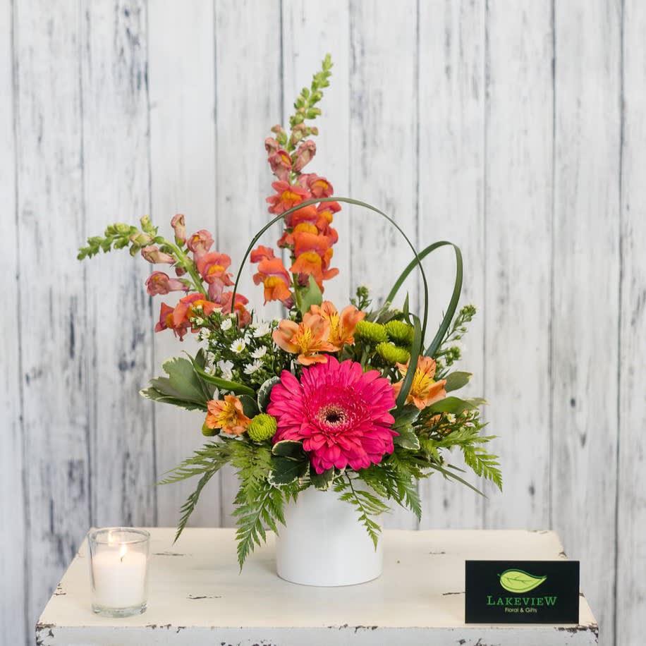 Tookie - Celebrate someone special with a modern design of bright blooms that includes fun lily grass loops!  Approximate Dimension: 17&quot; H x 11&quot; W