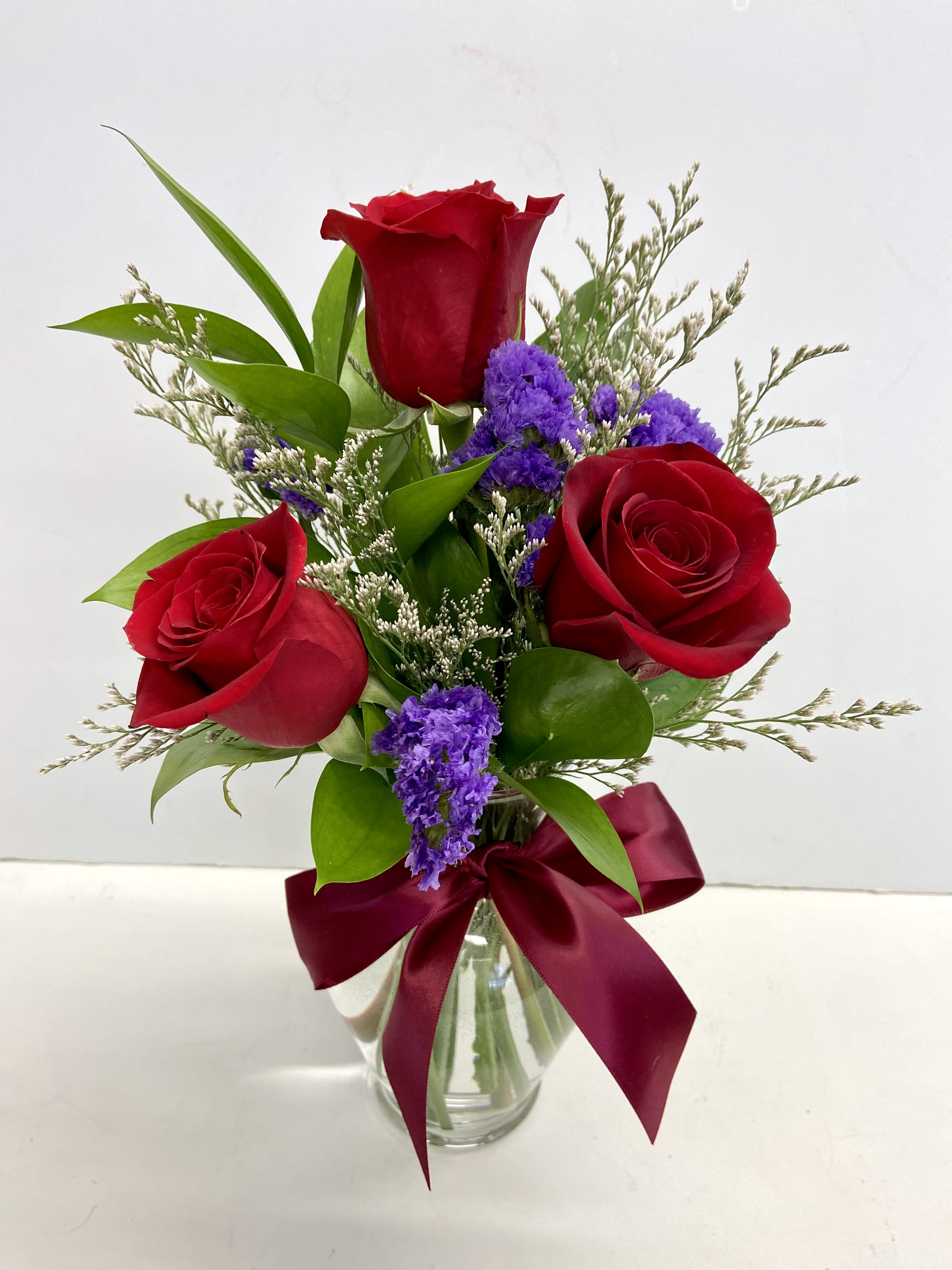  Love x 3 - 3 red roses with greens and purple statice just the simple message that I Love You!