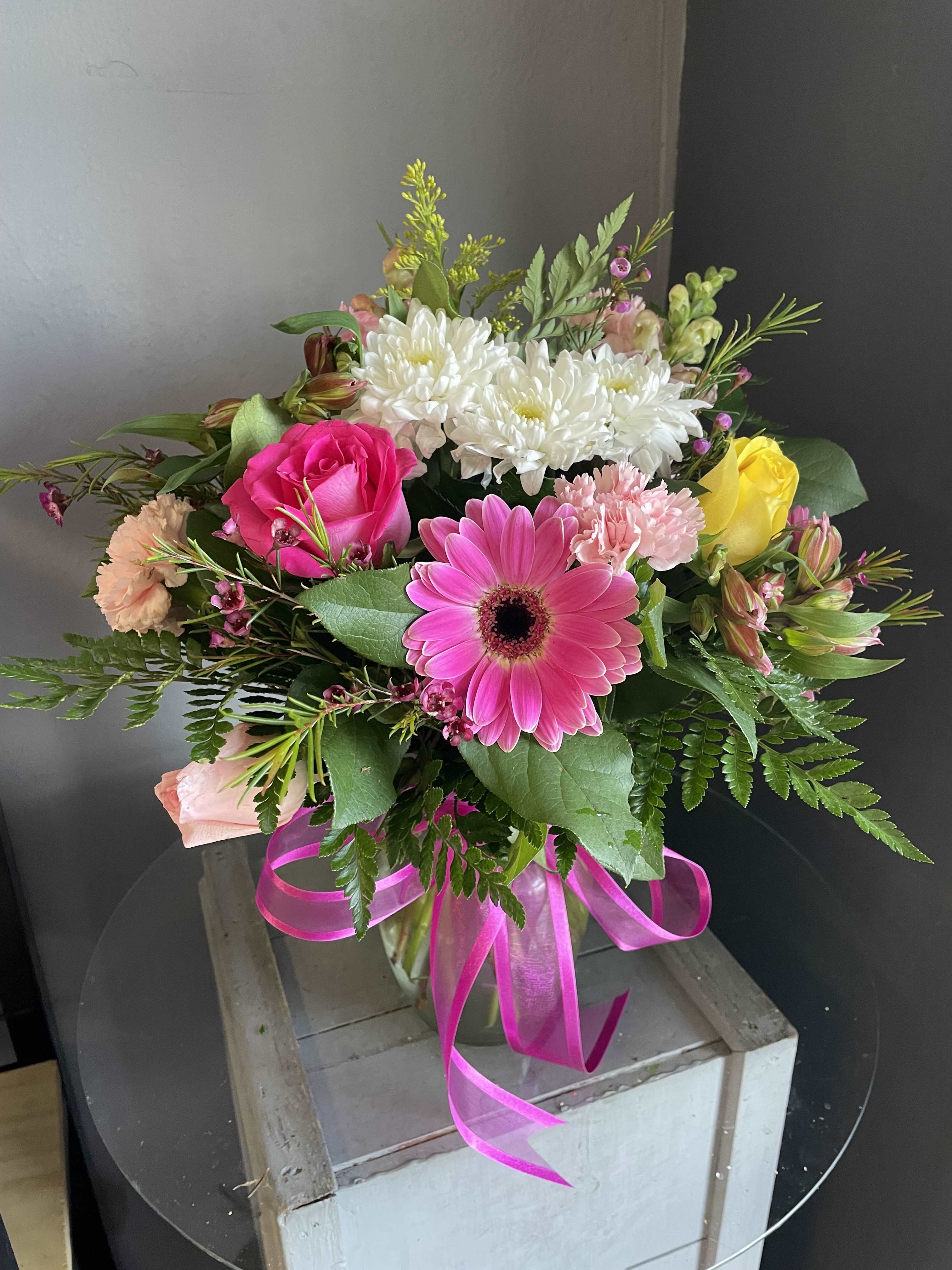 # 109 Spring Floral Arrangement - A beautifully selected bunch of the freshest flowers in a vase uniquely arranged by hand. 