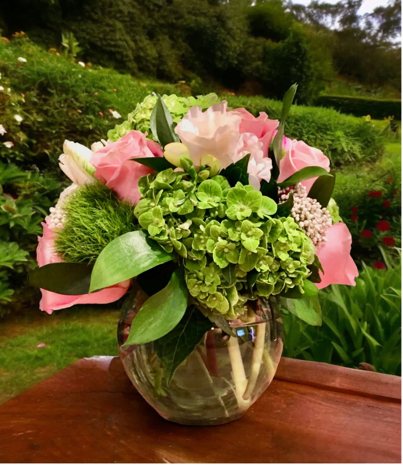 Pop of Pink - This bubble vase is back with shamrock hydrangea, pink roses, green and white parrot tulips and white rice flower and a touch of greens.  A nice pop of pink for any gift! Tax free. Same day hand delivery.