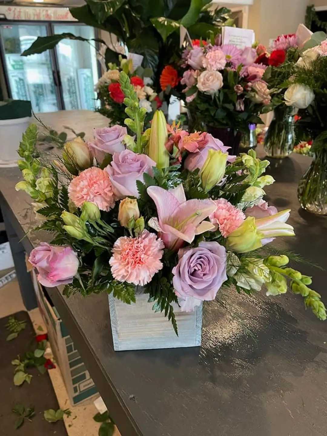Enchanted Love  - This beautiful lavender bouquet is guaranteed to brighten someone's day. Enchanted Love is perfect for someone's birthday or for anyone that needs cheering up.   Arrangement Details:  Dozen Lavender Roses APPROXIMATE DIMENSIONS:  10&quot;D X 10&quot;H