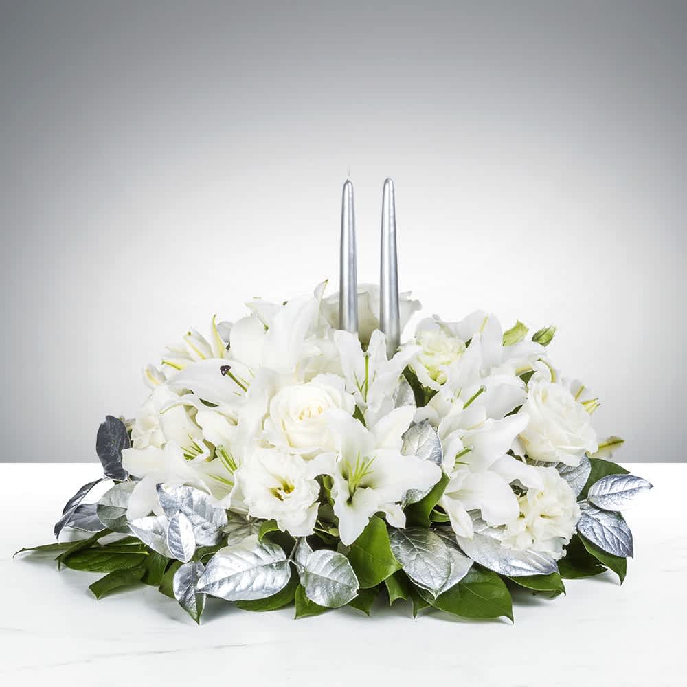 Burning Questions  - We all have unanswerable questions in our lives. What’s the meaning of life? What’s the best balance of career and family? What will we have for breakfast 47 days from now? The point of life is not to answer these questions, but to enjoy the ride. This season, enjoy the present moment with this Burning Questions centerpiece.  Flowers and candles may vary based on availability