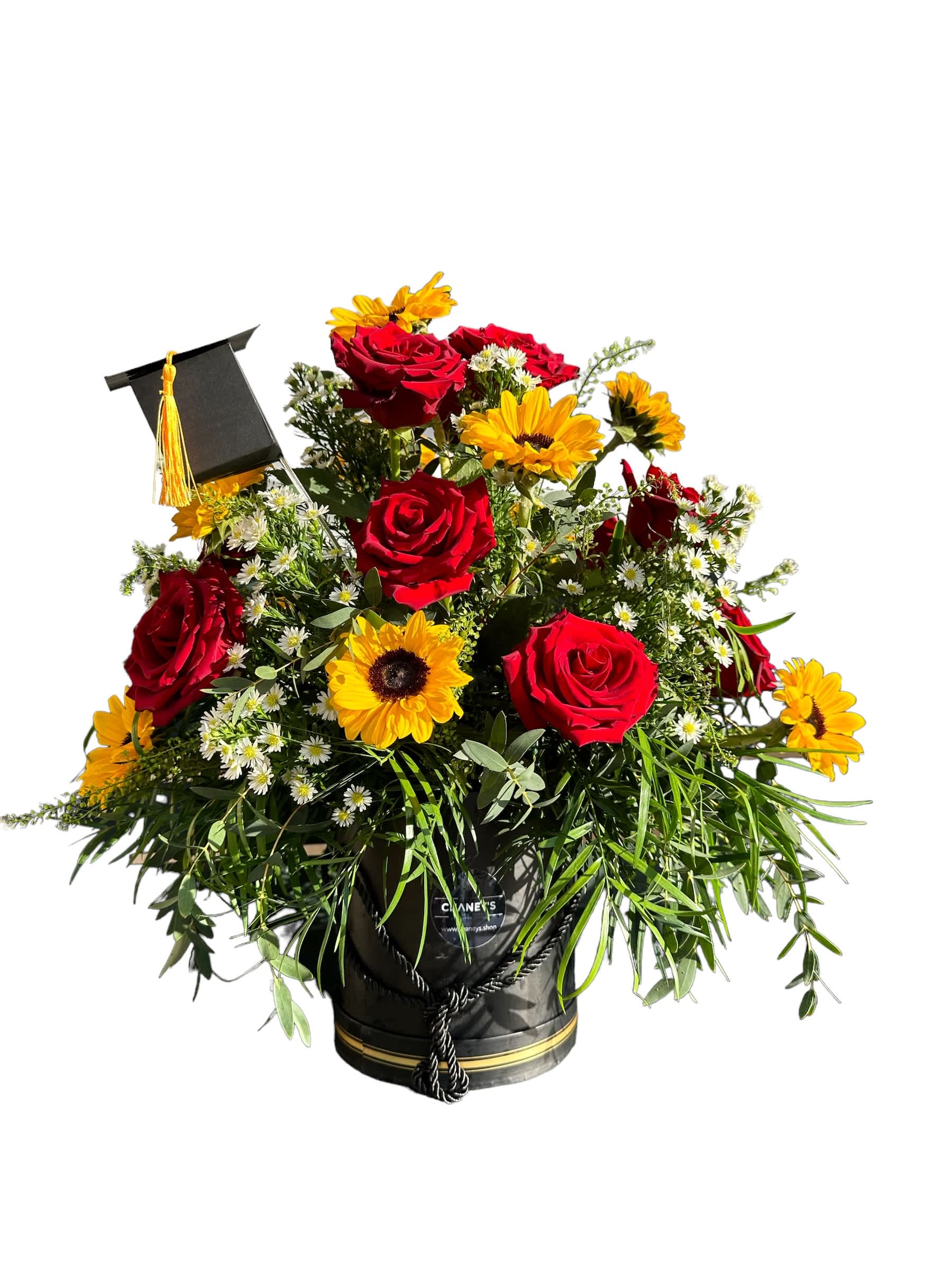Chaney´s Graduation and Prom (Designers Choice) - Prom Special including a graduation cap (little box for your gift)! Our floral designers will pick out the freshest flowers we have available and create a gorgeous floral bouquet for you.The top selling selection for the prom and graduation season! We design an absolutely stunning and original styled piece using the freshest seasonal flowers available at the time your order is placed. This glorious custom design is ready to take your recipient's breath away with the originality in design made by Chaney´s Art of Flowers!  