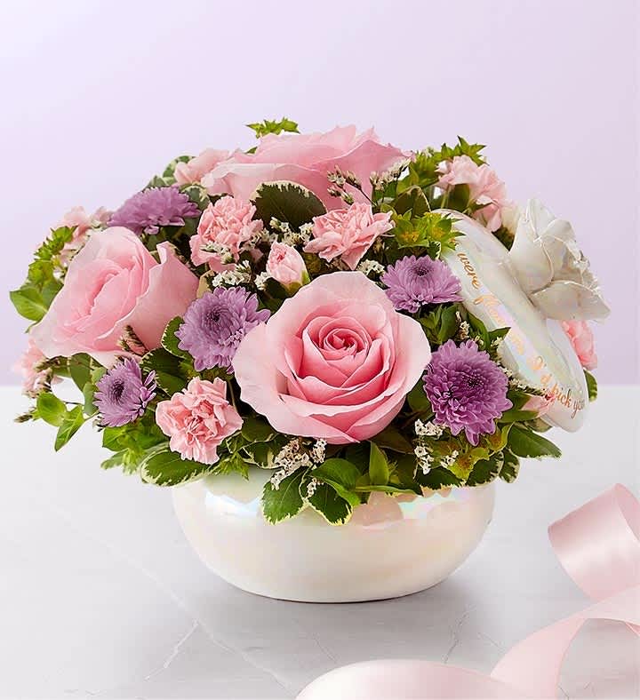 A Mother’s Love 2024 - This sentiment is beautifully captured in our garden-inspired bouquet, featuring a mix of pastel blooms in our keepsake canister