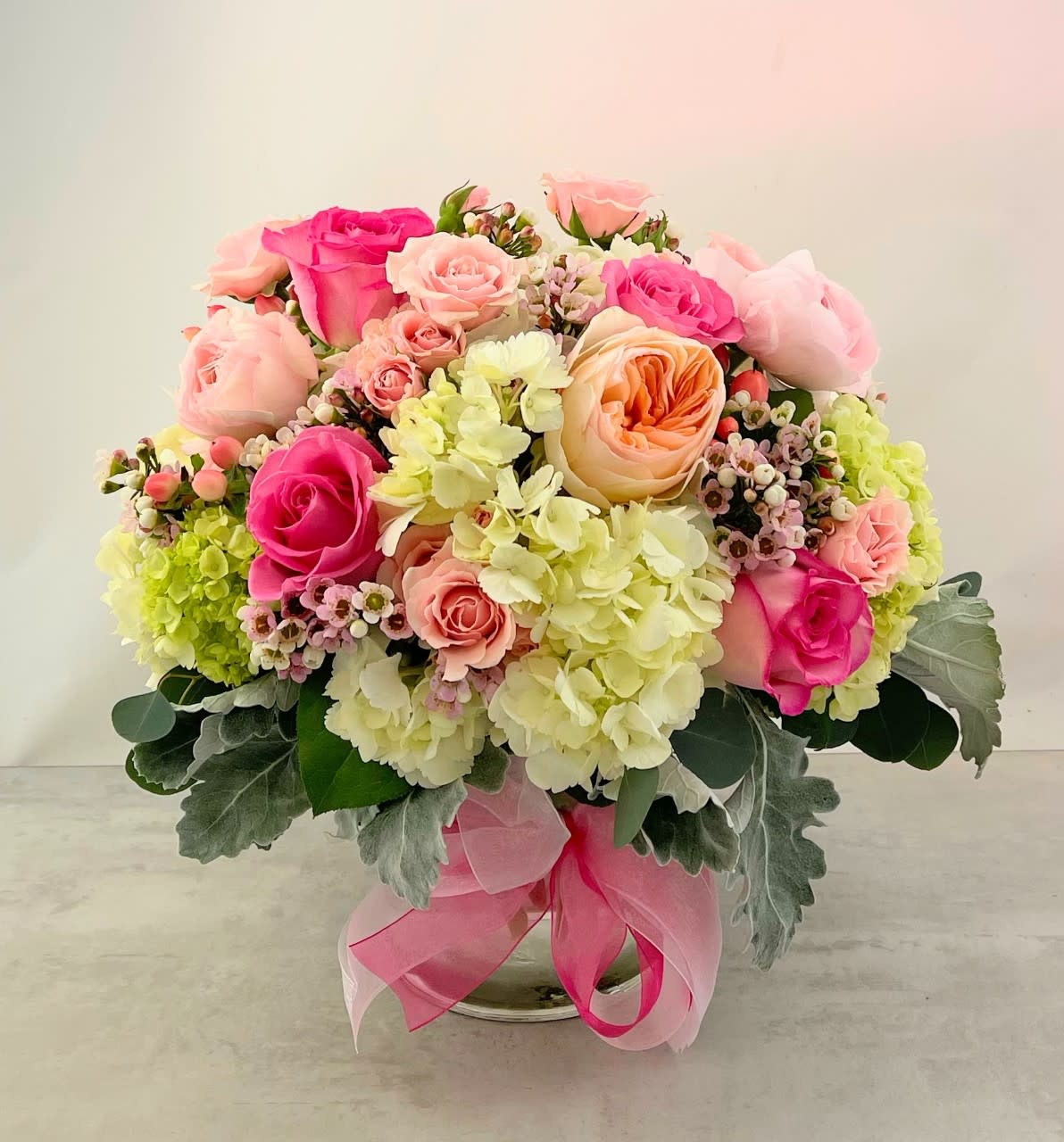 The Cameo Bouquet - Featuring premium pale peach Juliet Garden roses along with sweet unique pink roses and pale pink spray roses all nestled in lush hydrangea, Mom's Love bouquet contains all of Mom's favorites. This bouquet is a guaranteed hit that all Mother's will love to receive and be filled with loving thoughts of you.