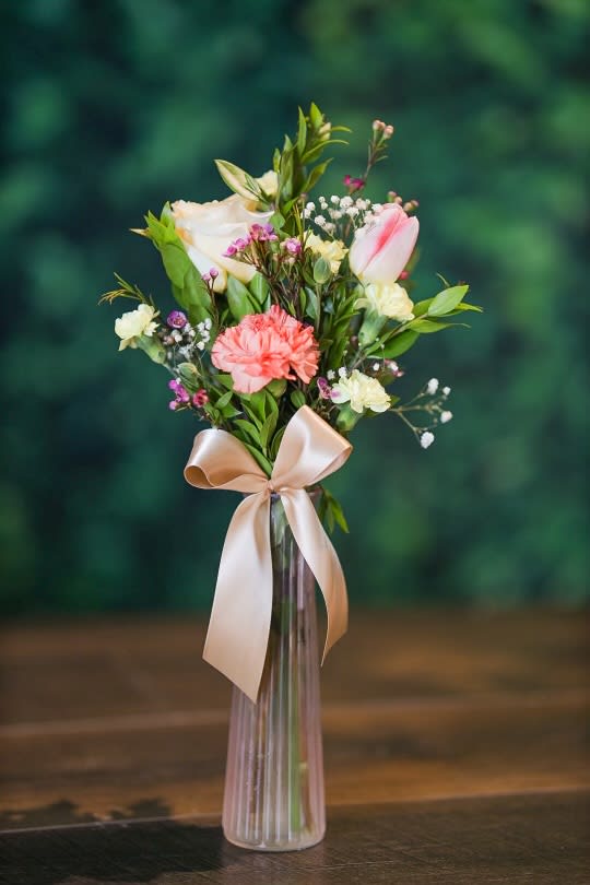 Standard Spring Bud Vase  - A simple and adorable bud vase. This arrangement contains Carnations, Tulip, Rose, Mini Carnation, Babies Breath. 