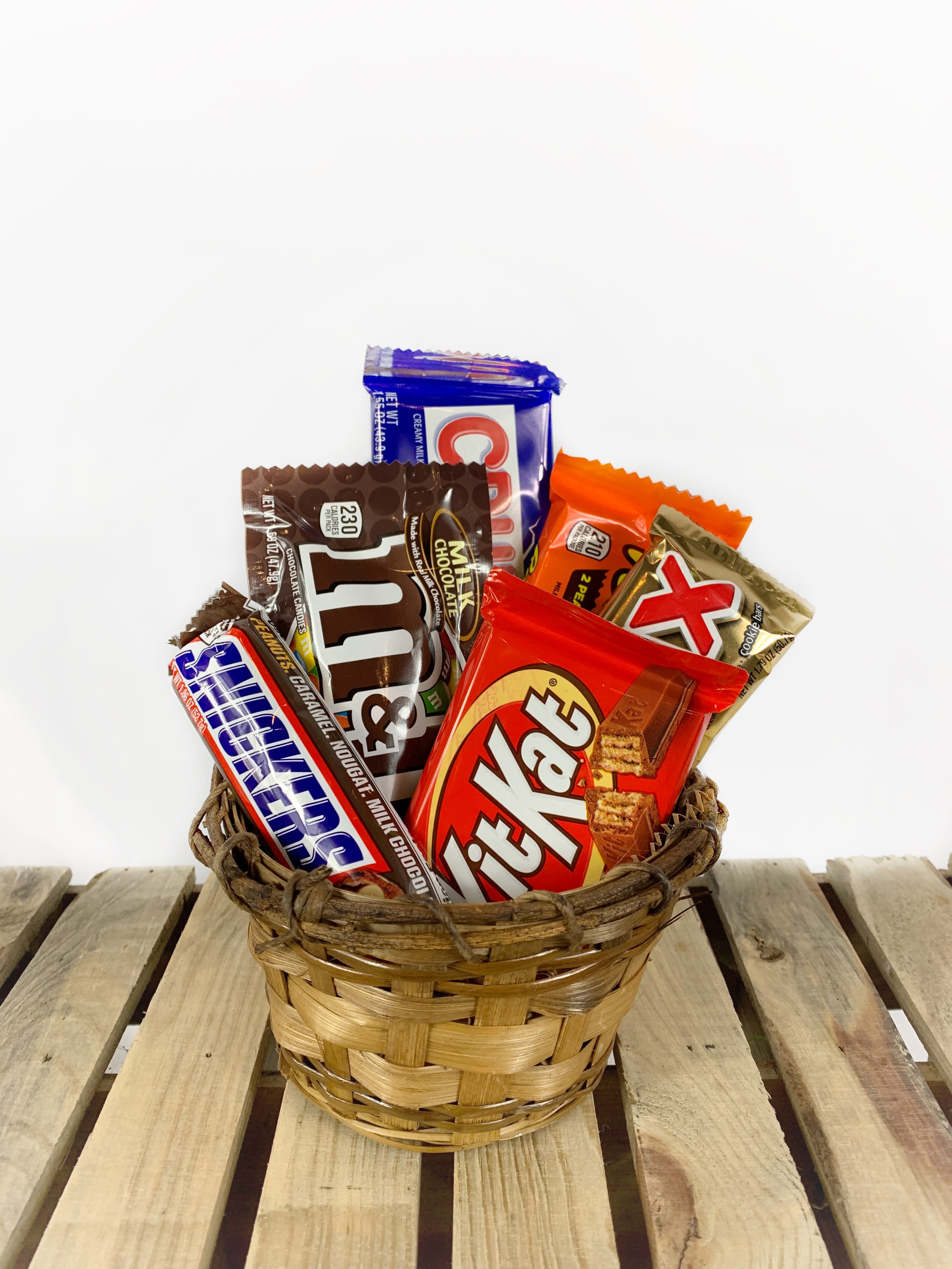 Small Chocolate Basket Small Chocolate Basket - Someone have a sweet tooth? Send this easy chocolate basket with mixed popular candy bars! Please Note: Standard Delivery for this product occurs in the afternoon, between 2:30pm and 7pm. If you need it by a certain time, there is an option to select a timed window for scheduled deliveries.
