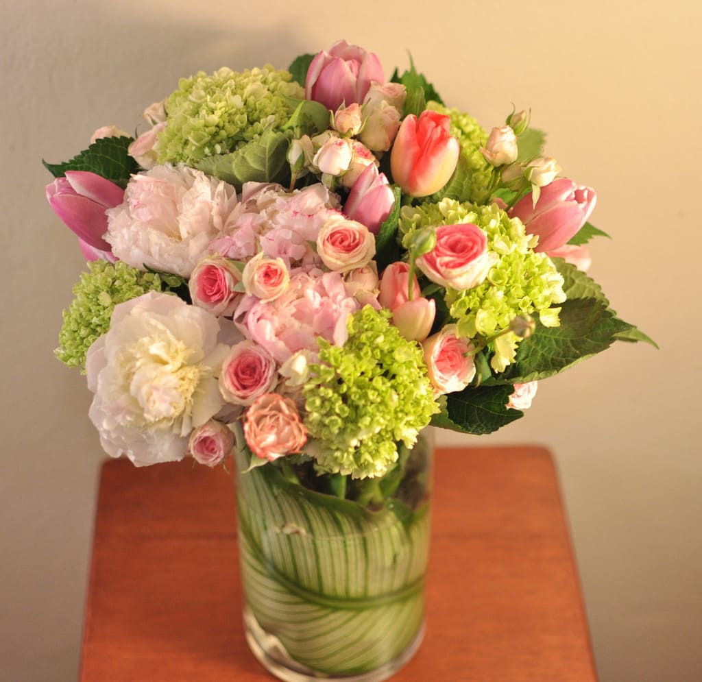 Fleurs de May Fleurs de May - Peonies (Juliet garden roses will be used when peonies are not available), roses, tulips, ranunculus, and hydrangeas.