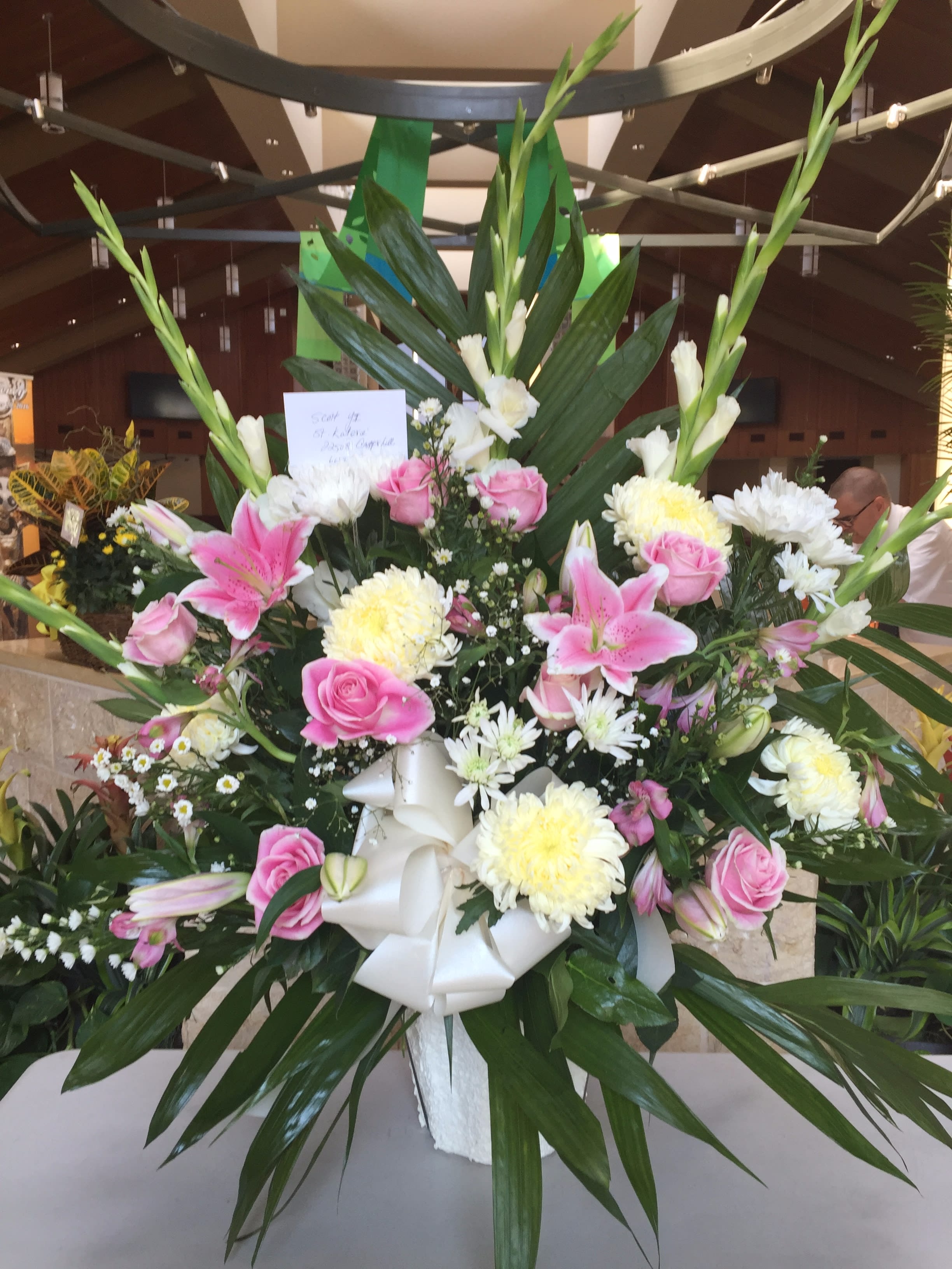 Thinking of You - Type of flowers: Gladiolus, Lillies, Cushion Mum, China Mum, Alstromeria, Baby Breath, Greens. Season Availability: all year round Dimensions: Paper Mache 8&quot; by 8&quot; Substitute Availability: Yes