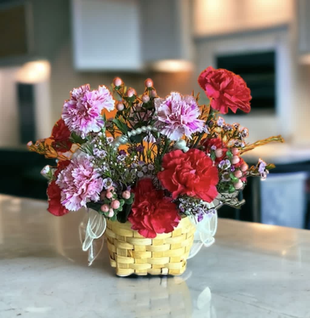 I love mom I love mom - Red & pink carnations mix and the basket handle are decorated with pearls. Basket size: H 4* W 3 Total size: H 10* W 10