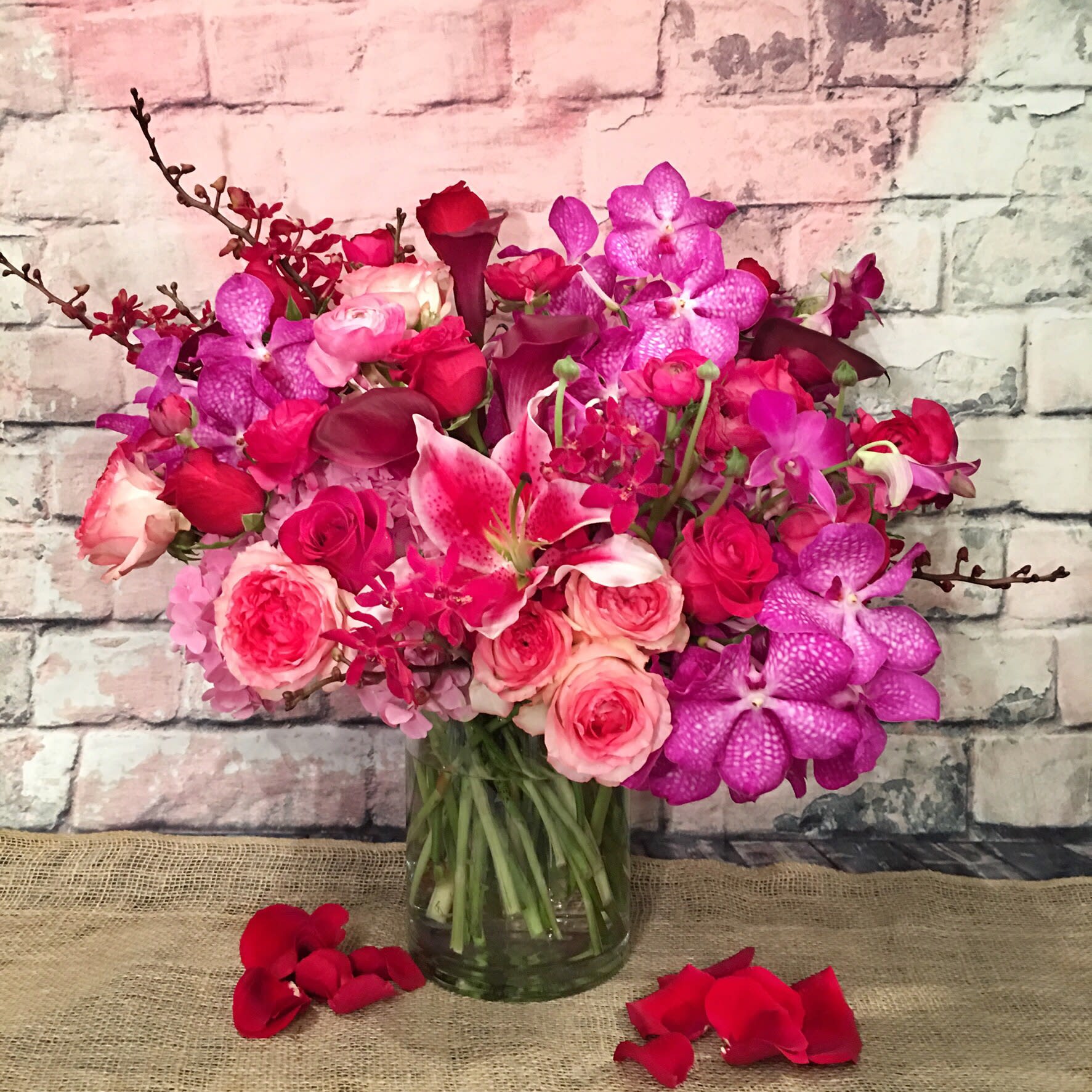 CE LA VIE CE LA VIE - The perfect assortment of garden flowers that includes: garden roses, orchids, lily's, hydrangeas, ranunculos and calla lily's.