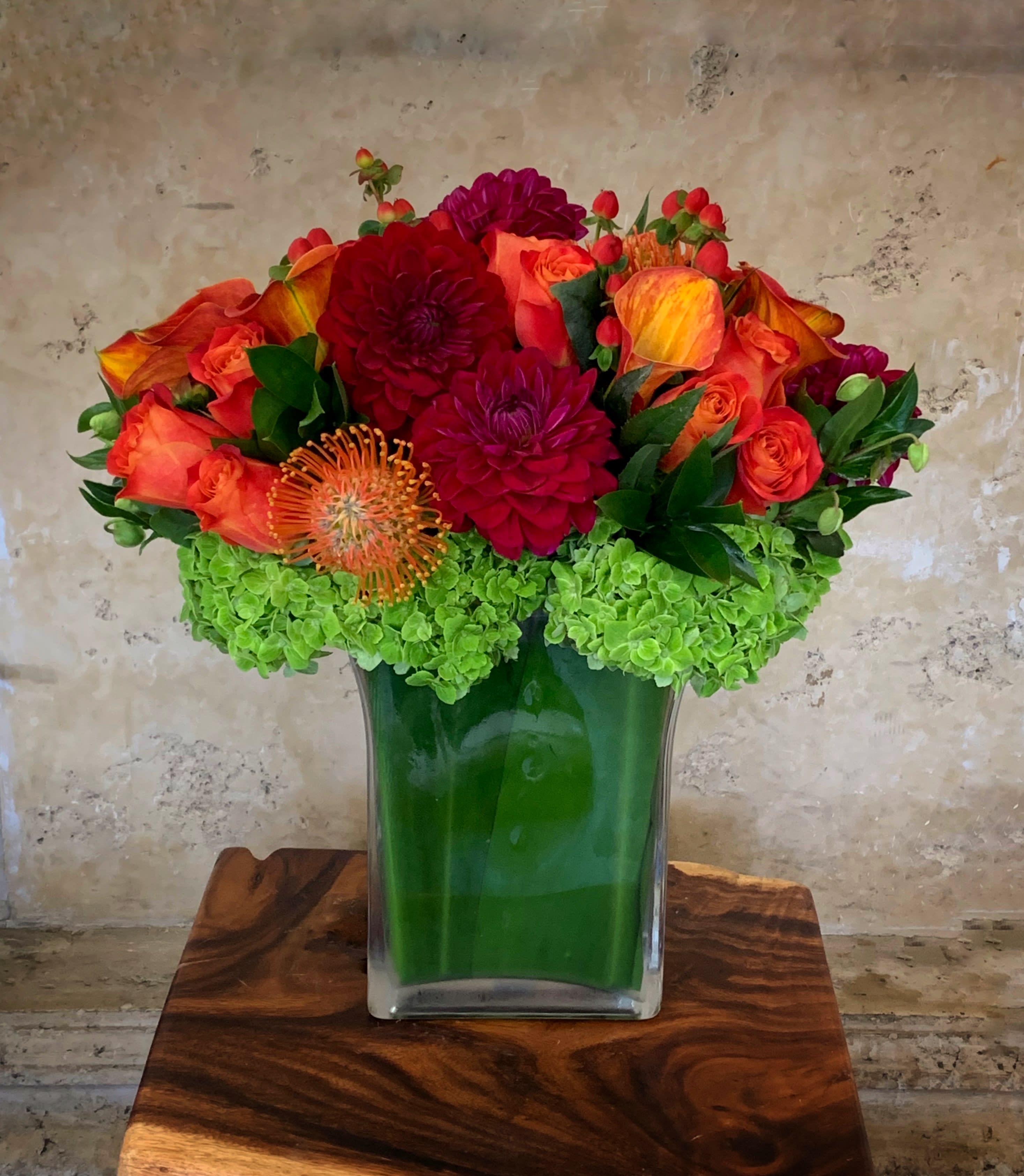 San Francisco  - Premium Roses, Hydrangea, Dahlias, Calla Lilies, Protea  nice green leaves in glass vase. H 18&quot; x W 8&quot; 