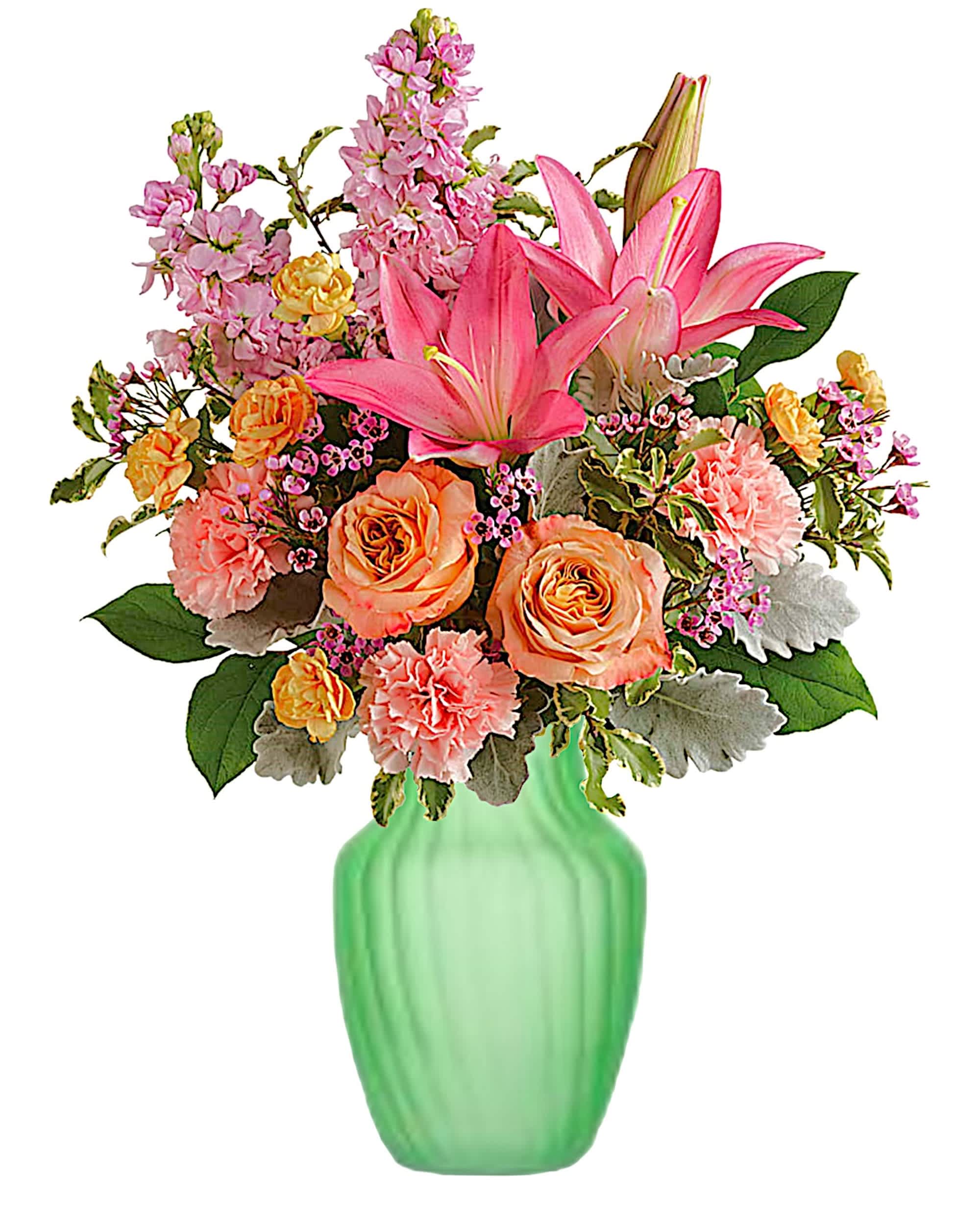 Pretty and Posh - Brighten any day with blushing blooms, cheerfully presented in a glass vase they'll enjoy for years to come!  DETAILS Peach roses, pink Asiatic lilies, pink carnations, peach miniature carnations, pink stock, pink waxflower are accented with dusty miller, pitta Negra, and salal leaf.  Item # NFMD-01-1  FLORIST-TO-DOOR  Orientation: All-Around  BLOOM DETAILS Roses Asiatic Lilies Carnations Mini-Carnations Stock Waxflower Filler Greenery  The Standard Arrangement is approximately 19 1/2&quot; H x 14 1/2&quot; W. The Deluxe Arrangement is approximately 19 1/2&quot; H x 14 1/2&quot; W. The Premium Arrangement is approximately 20&quot; H x 15&quot; W.  Designed by our award-winning florist designers.  HOW TO CARE FOR YOUR FLOWERS 1. Keep in a location without direct sunlight and away from extreme heat or cold. 2. Replace the water regularly, and mix in the flower food packet provided 3. Trim the stems every other day 4. As flowers/foliage wilt, remove &amp; discard  Please Note: The arrangement pictured reflects an original design for this product. While we always do our best to follow the original flower recipe, the exact flower or container is sometimes unavailable. We may replace items of equal or greater value to deliver the freshest flowers possible while keeping the style &amp; color palette. We assure you that we will create a beautiful, fresh flower arrangement with only the best quality flowers to keep you as a loyal customer.  How to place an order? We have several options. 1. You can place an order directly on this secure website. 2. You can call in your order by dialing: (323) 262 - 9238 3. You can visit our store (appointment recommended 323.262.9238)  NINFA'S FLOWERS 2405 WHITTIER BLVD. LOS ANGELES, CA. 90023  ATTENTION: *Please note that on busy holidays, Valentine's Day, and Mother's Day, we cannot verify if the recipient received the flowers until the following day because our drivers don't turn in their signature delivery tablets until the following day. You can verify delivery on the website after 10:00 pm or you can call 323.262.9238 the following day after 10:00 am. Thank you for your patience and understanding.