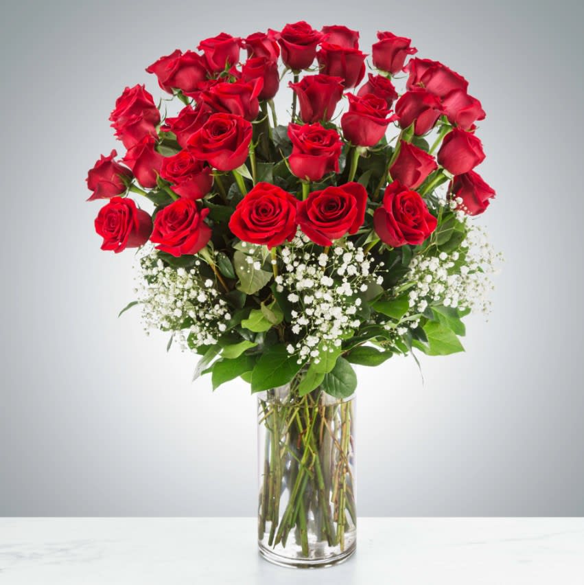 Grandeur Long Stem Rose Arrangement by BloomNation™ Grandeur Long Stem Rose Arrangement by BloomNation™ - This luxurious and extravagant three-dozen, red rose arrangement will speak the language of your heart. These extra-large roses are special order, please order 24-48 hours prior, or call the shop for availability and, or options.