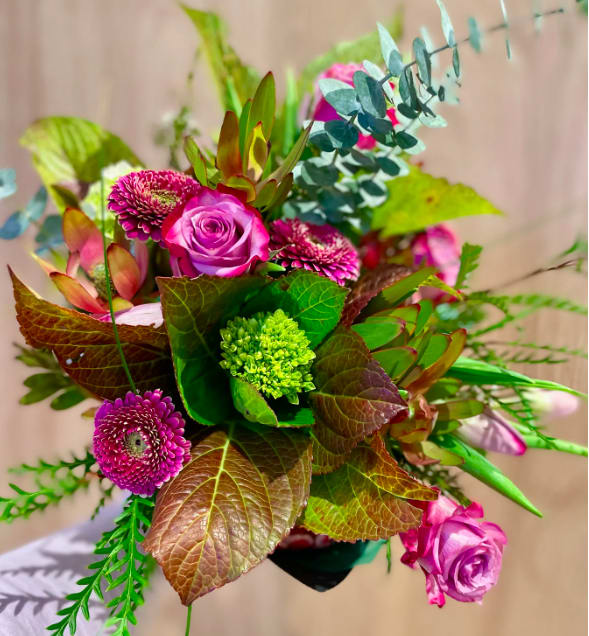 PICK UP MOTHERS DAY BOUQUET - A lovely seasonal bouquet of the most gorgeous seasonal blooms. This bouquet is wrapped up with nice ribbon for your Mommason to put in her own vase.