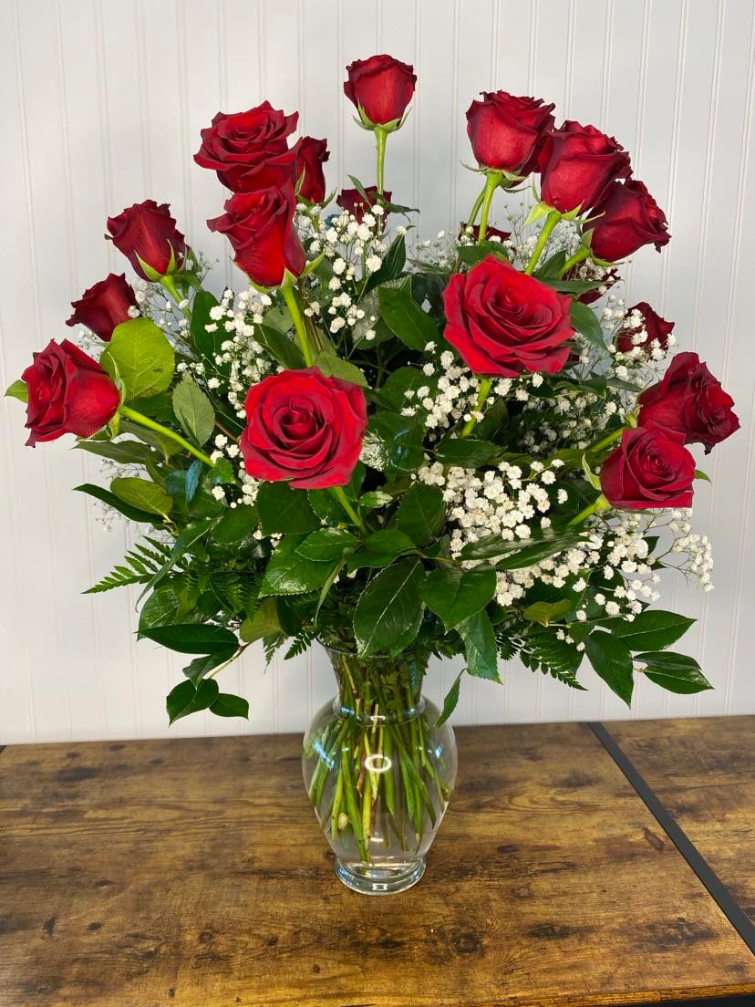 Two Dozen Red Roses Two Dozen Red Roses - A true love bouquet 24 red roses, baby's breathe, leather leaf fern