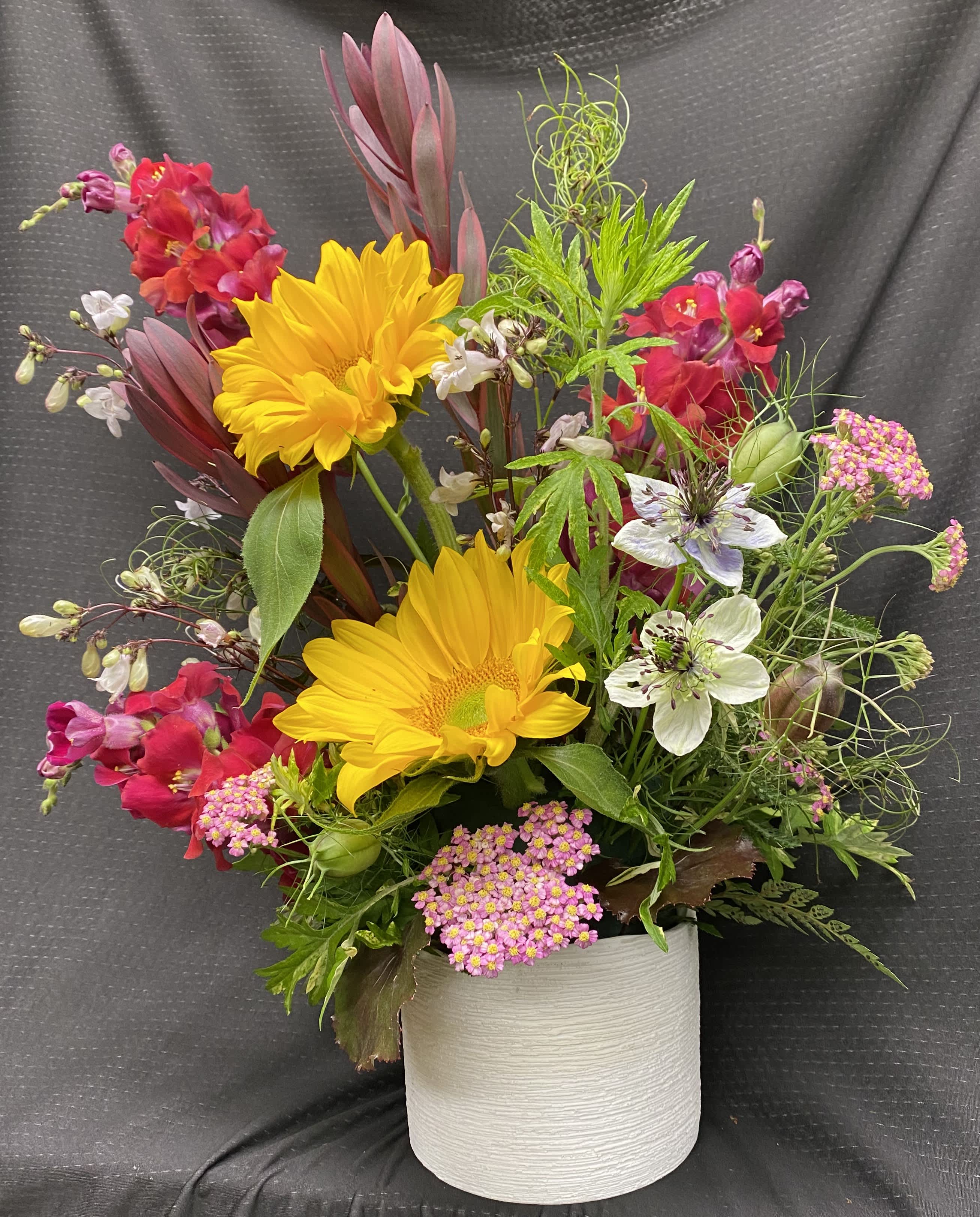 Touch of Summer - Vase arrangement with snapdragons, mums, and columbine