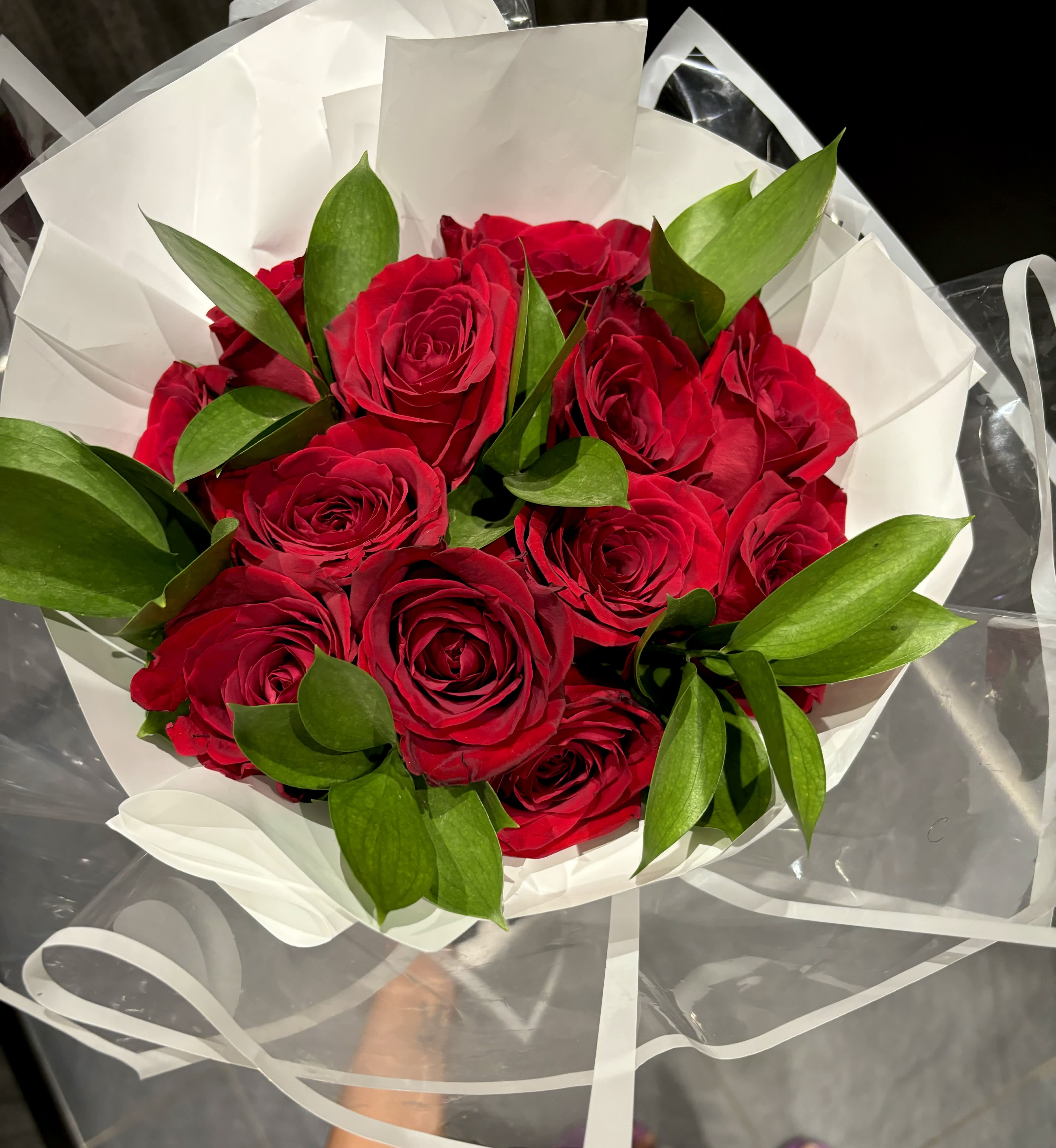 You’re the Best - Is there even a better way to tell someone or yourself, “You’re the Best”? This bouquet is created with a  Dozen red roses wrapped in our clear paper. 