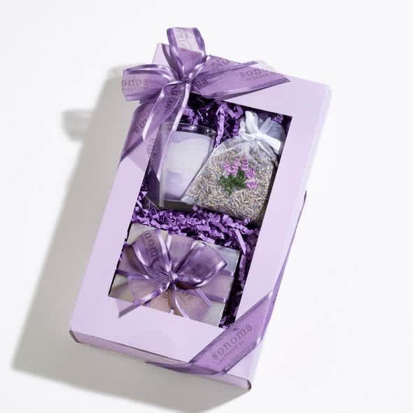 GIFT SET TRIO - LAVENDER GIFT SET TRIO - LAVENDER - Our lavender treatment gift set includes two bars of our hand-poured olive oil and 100% pure, lavender, essential oil soap plus a 20-hour lavender soy candle made from soy wax and 100%, pure, essential oil. the candle is topped with a wooden lid. packaged together in a pretty gift box and tied with a ribbon makes this gift ready.
