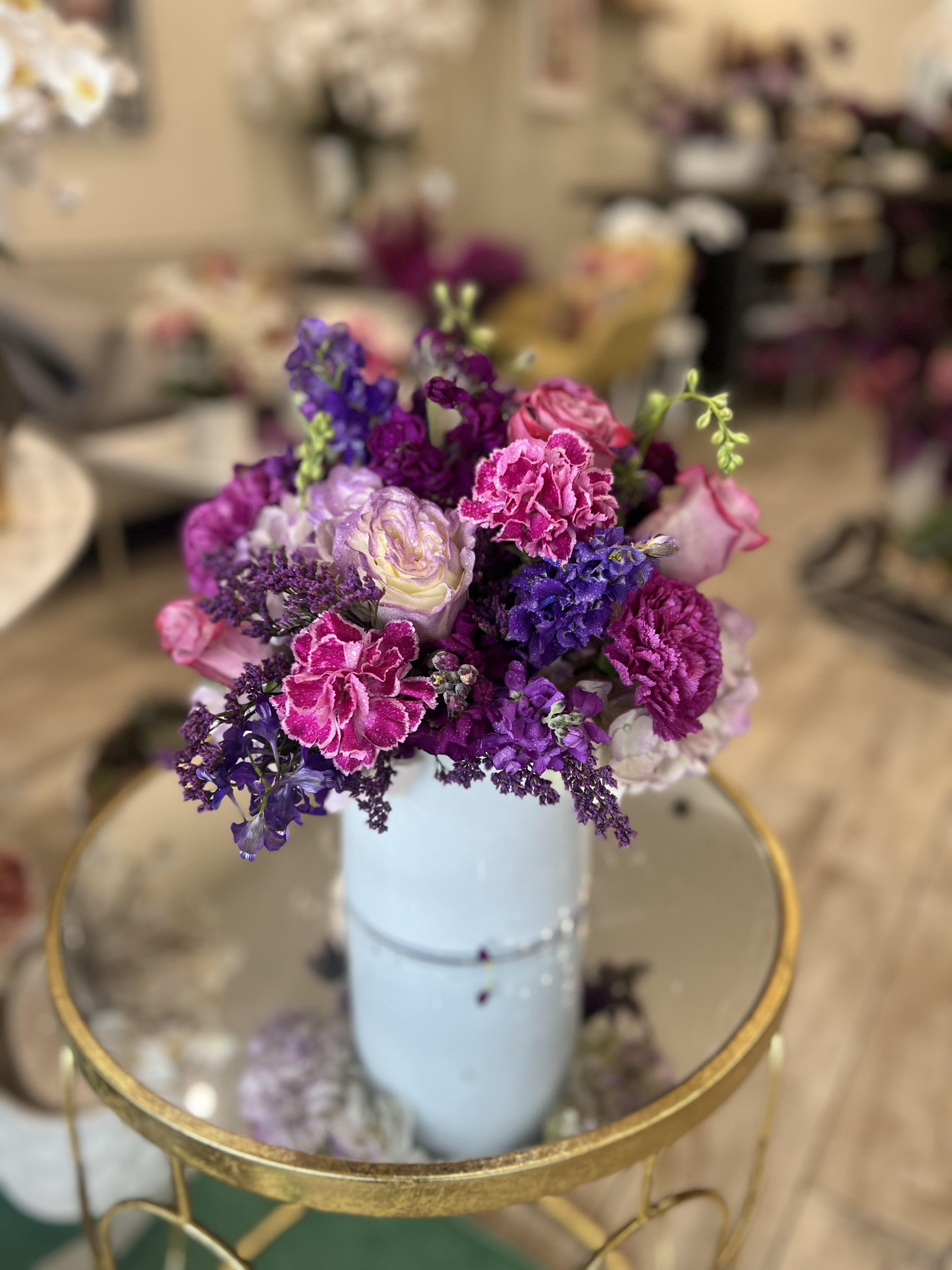 Mixed Spring Bouquet  - Stunning mix of spring flowers in stylish white glass vase 