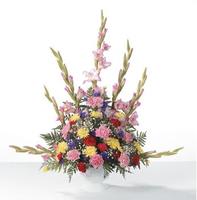 Traditional Funeral Basket Traditional Funeral Basket - Composed of mixed flowers in seasonal colors, this arrangement will convey your heartfelt sympathy.