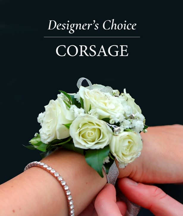 Designer's Choice Corsage - Leave the design to the professionals.  We will meticulously hand make your corsage with fresh florals (neutral colours) and greenery that will surely impress and match almost any attire.