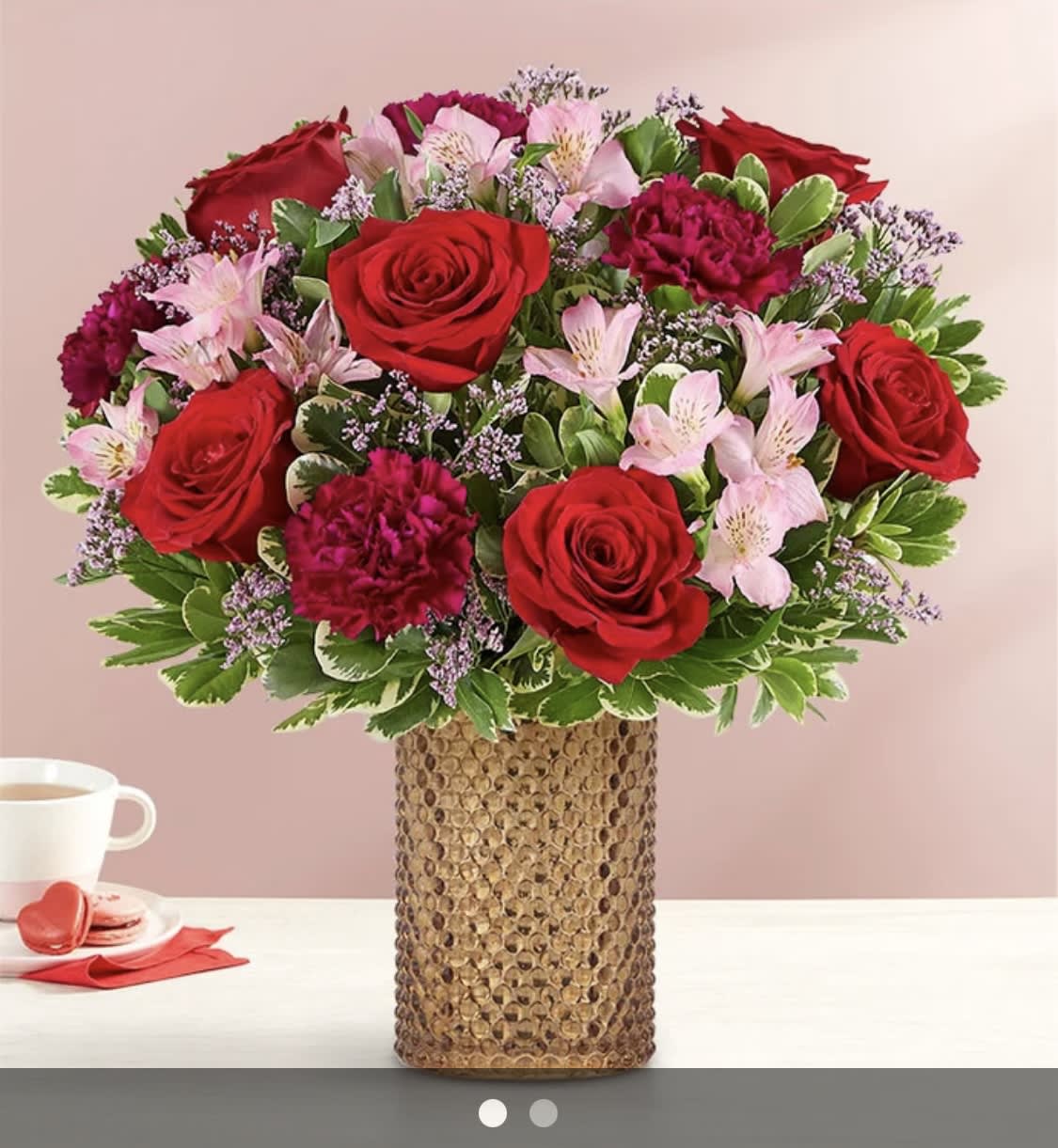 Victorian BOUQUET - Description EXCLUSIVE  captured in flowers. Our striking bouquet is gathered with rich red, pink and purple blooms and accented with lush greenery. Designed in our Victorian-inspired hobnail vase, featuring a champagne mercury finish, this gift leaves a lasting impression on someone you love.