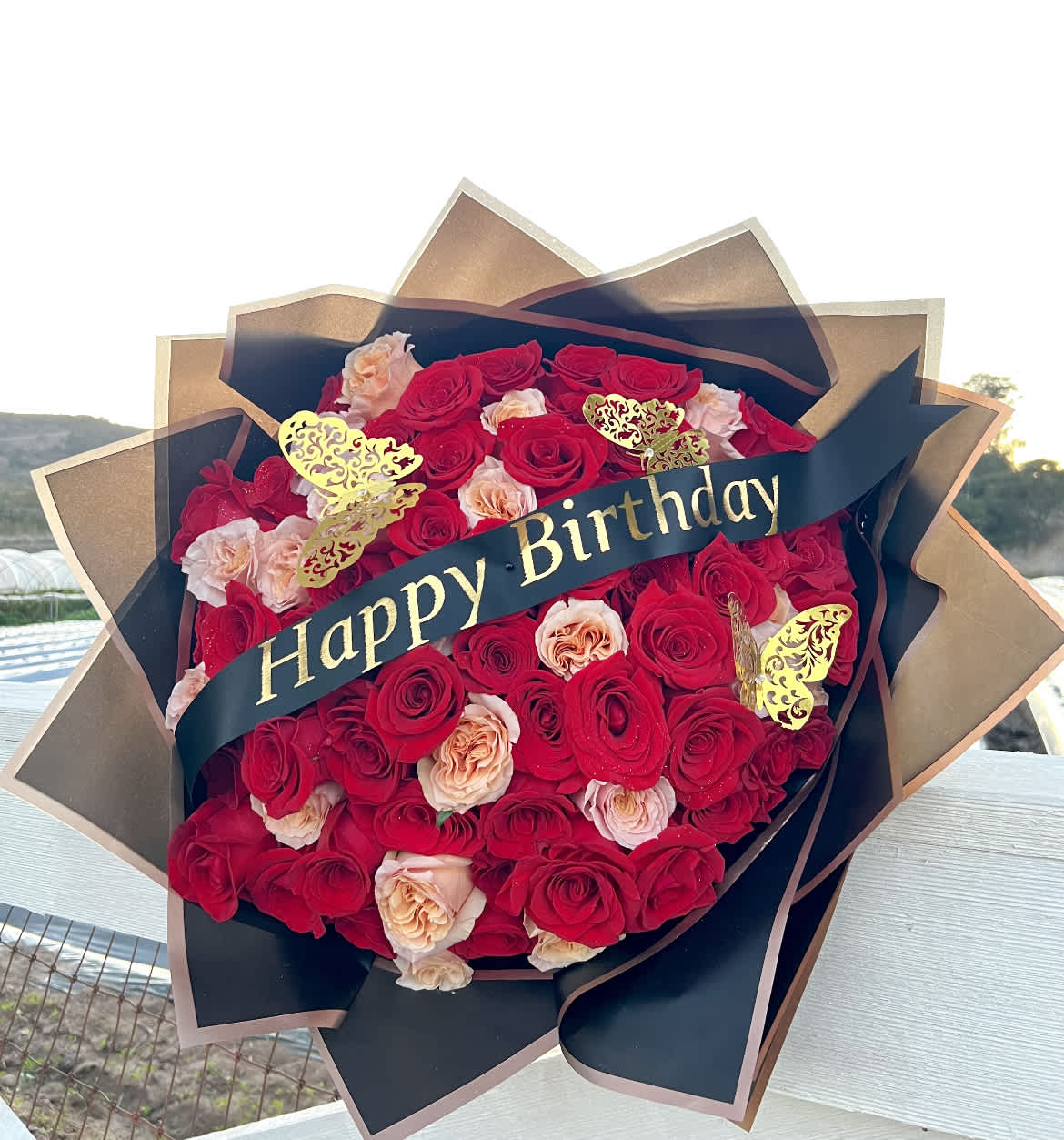 Feeling Special Bouquet  - A stunning all rose bouquet for any occasion with added butterfly's and a custom ribbon added. For Custom Ribbon: Please specify your message in special instructions.   